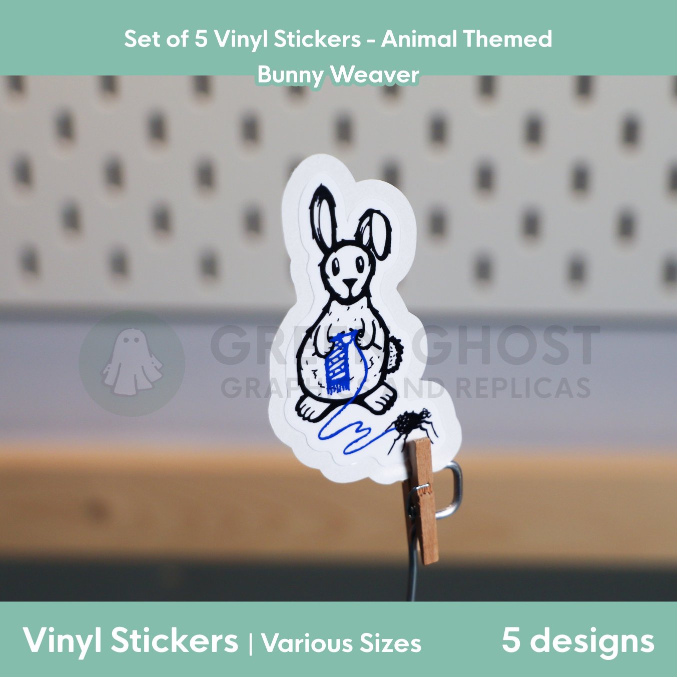 Rough lino printed style sticker of a rabbit with her pet spider whilst knitting a blue scarf on a blurred peg board background.