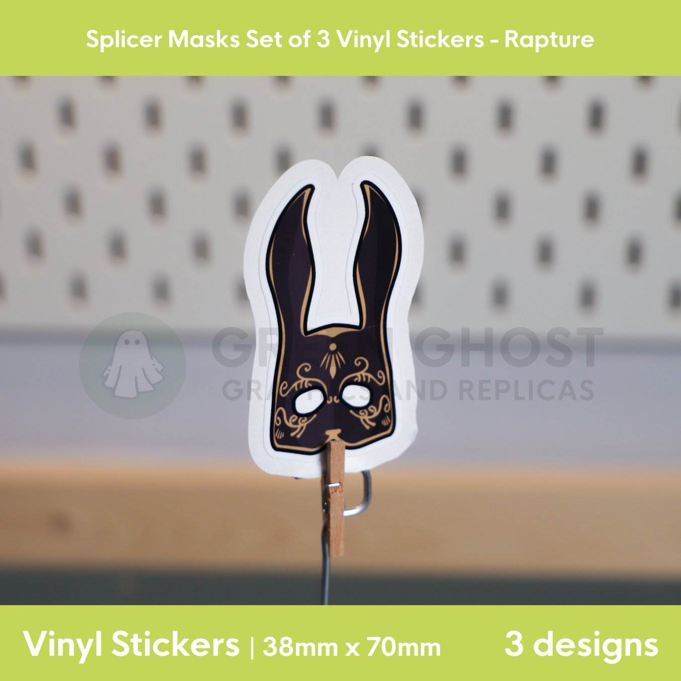 Black and gold bunny mask on a blurred peg board background.