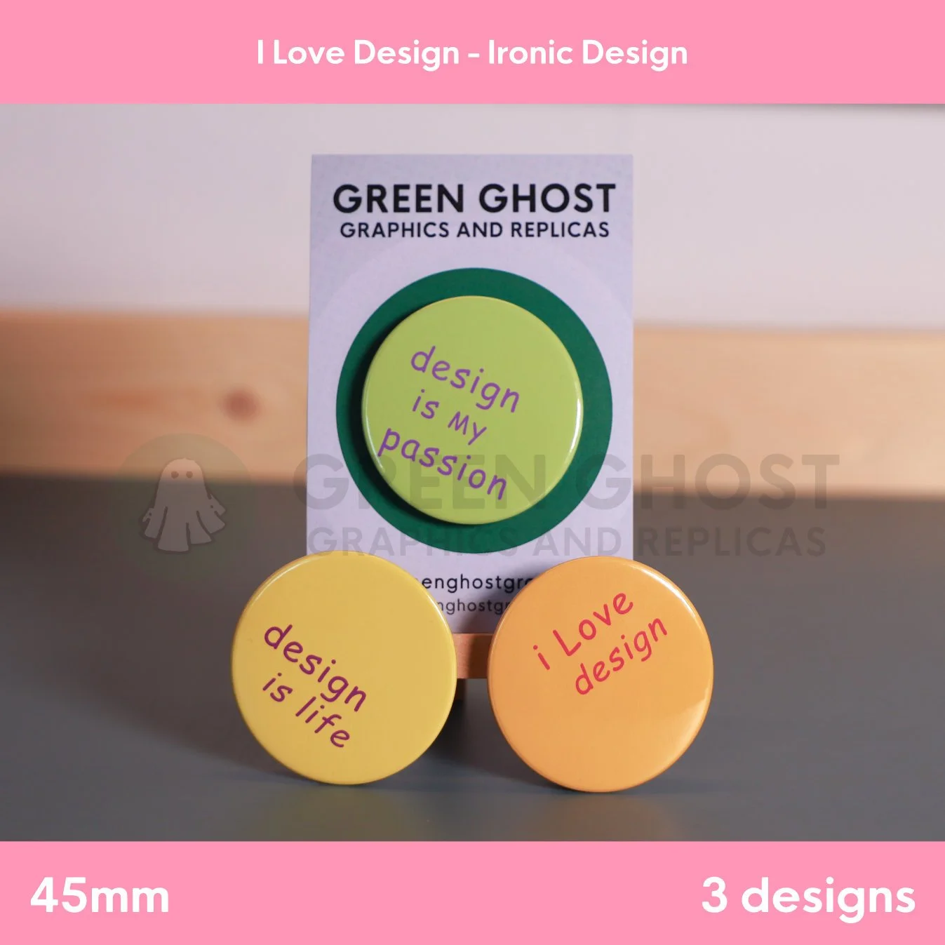 A set of three colourful round badges with phrases “design is my passion,” “design is life,” and “i Love design” arranged on a branded display card.