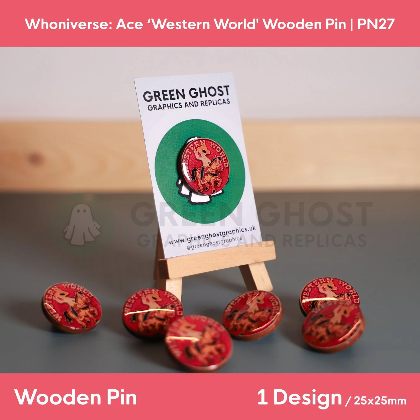 A circular “WESTERN WORLD” wooden pin attached to a branded backing card on a wooden easel, with several identical pins scattered around the base.