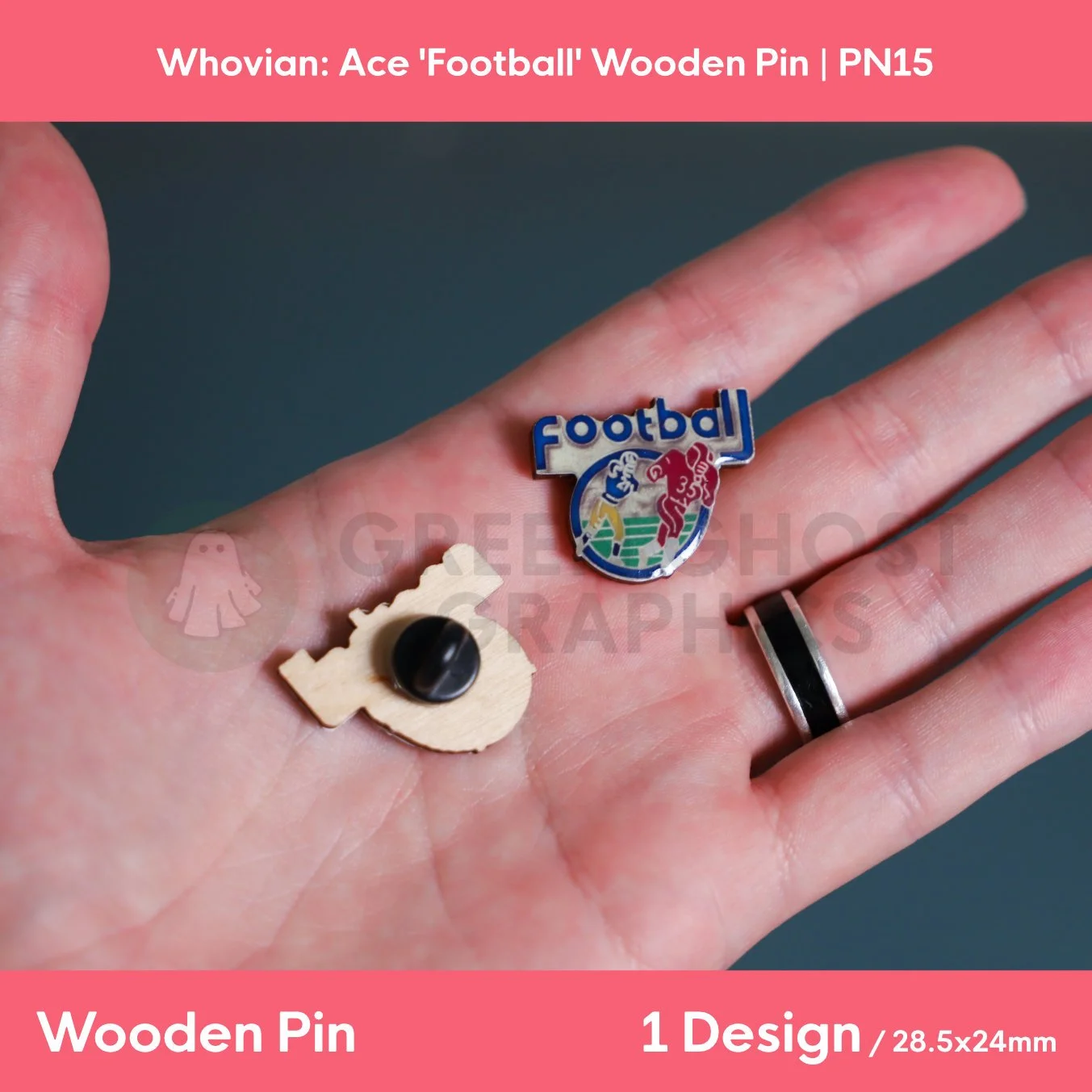 A wooden pin with blue “Football” text and a multicoloured football graphic shown in a hand alongside the natural wood reverse and black rubber clasp.