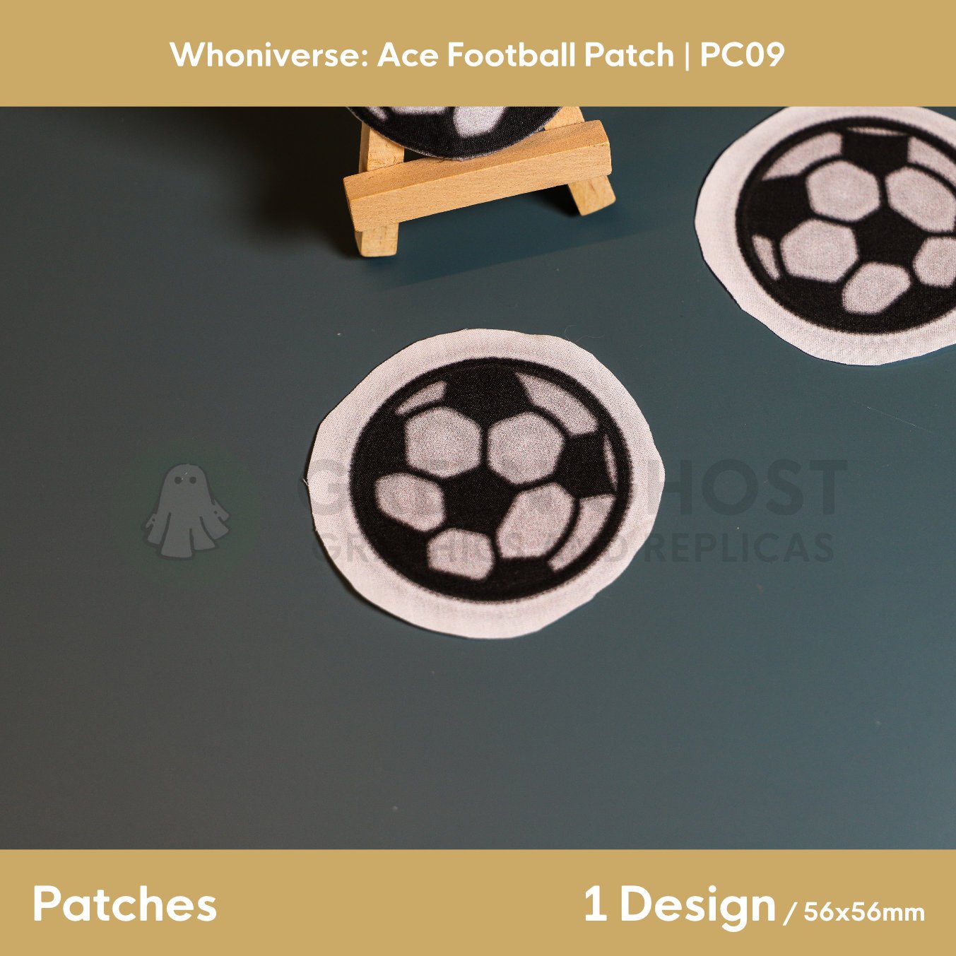 Close up of the uncut unfinished version of the football patch design, on a plain aqua green background.