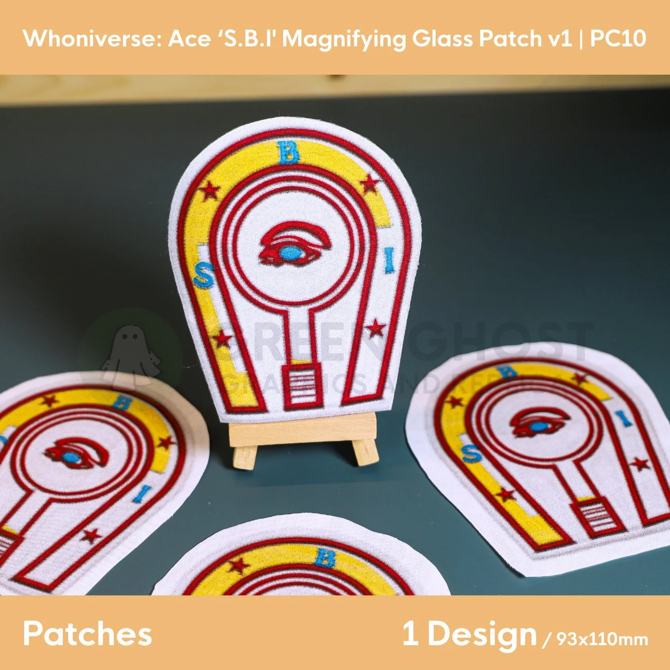 Close up of the finished SBI horse shoe patch on a small easel on a aqua green background.