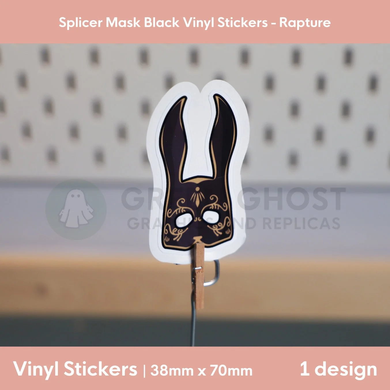Rabbit mask with gold detailing on a blurred peg board background.