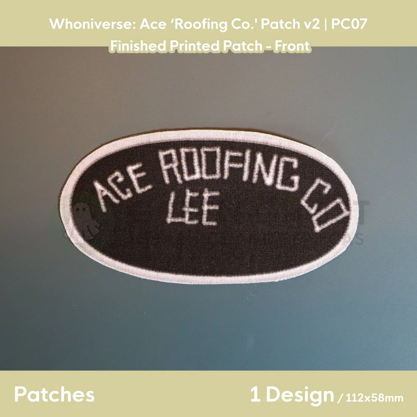 Finished version of the Roofing patch laid flat on a table showing the front design.