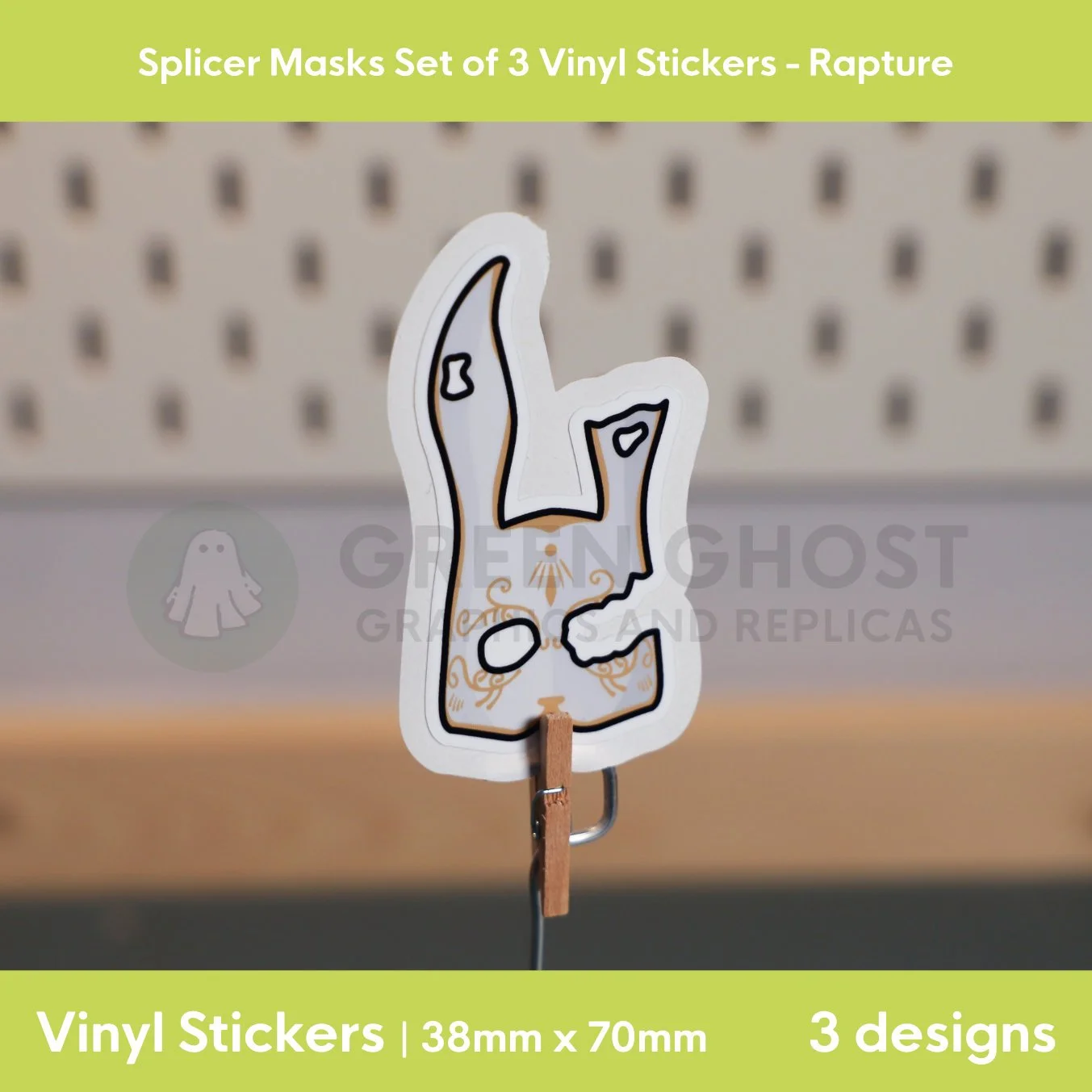 Broken bunny mask with gold detailing on a blurred peg board background.