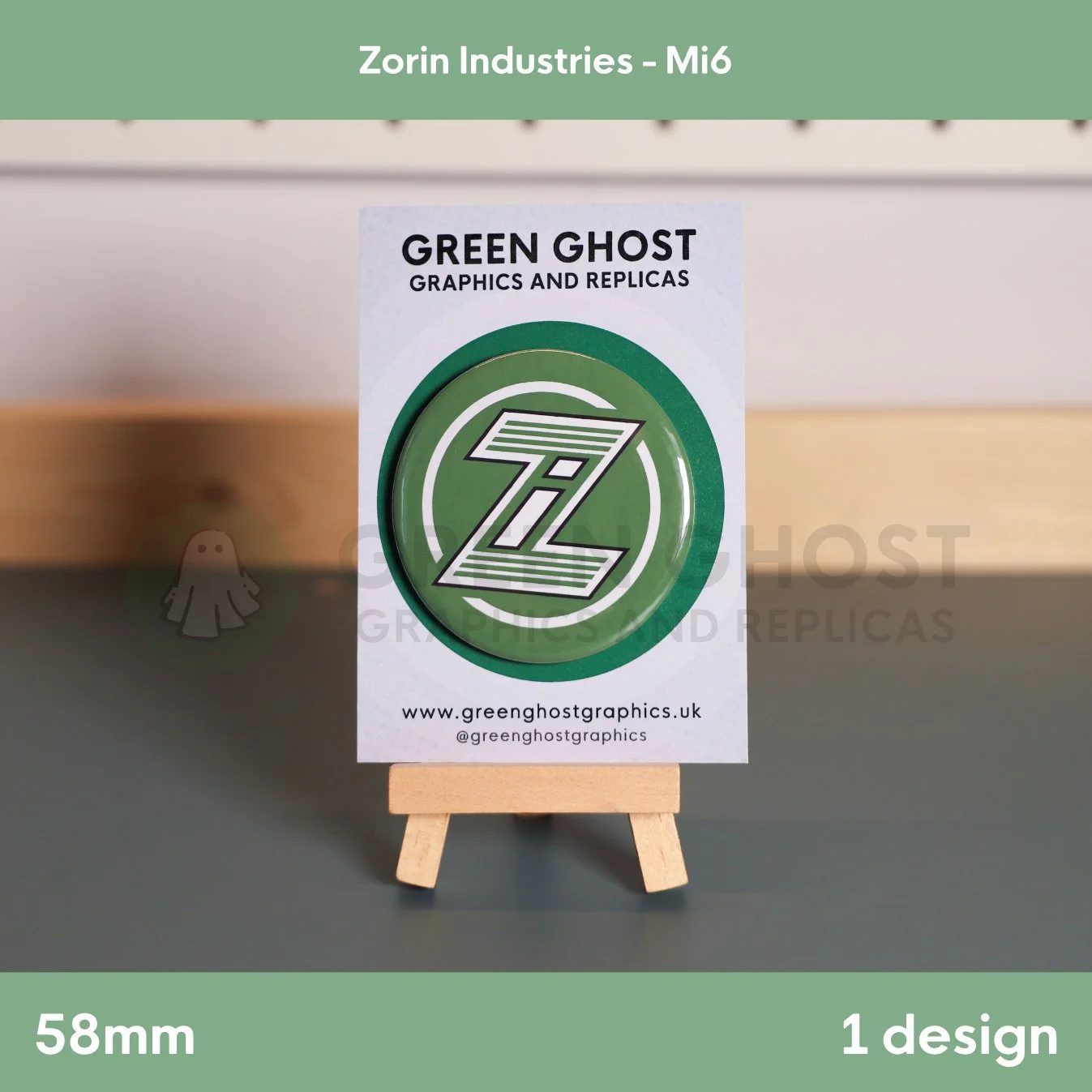 A round badge featuring a white and green “Z” symbol mounted on a branded card on a wooden easel.