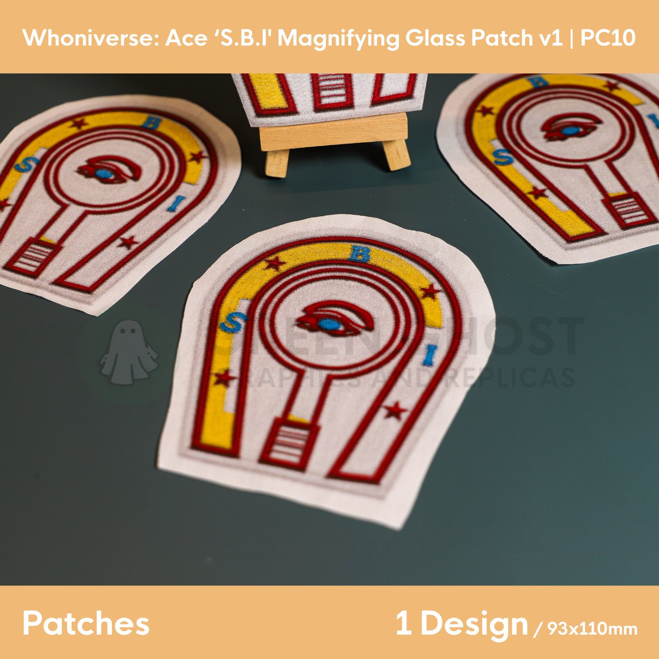 Close up of the uncut unfinished version of the Horse shoe SBI patch design, on a plain aqua green background.