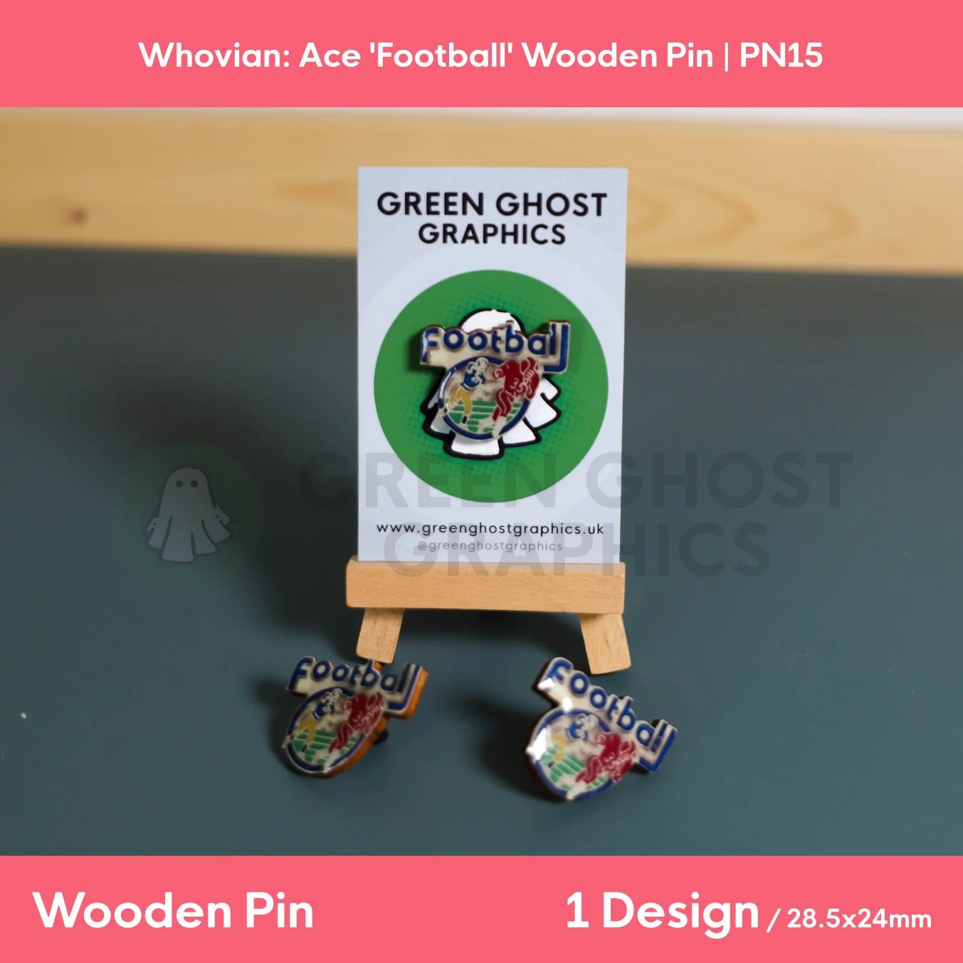 Three wooden pins featuring the word “Football” in blue lettering and a colourful football motif arranged around a branded display card on a small easel.