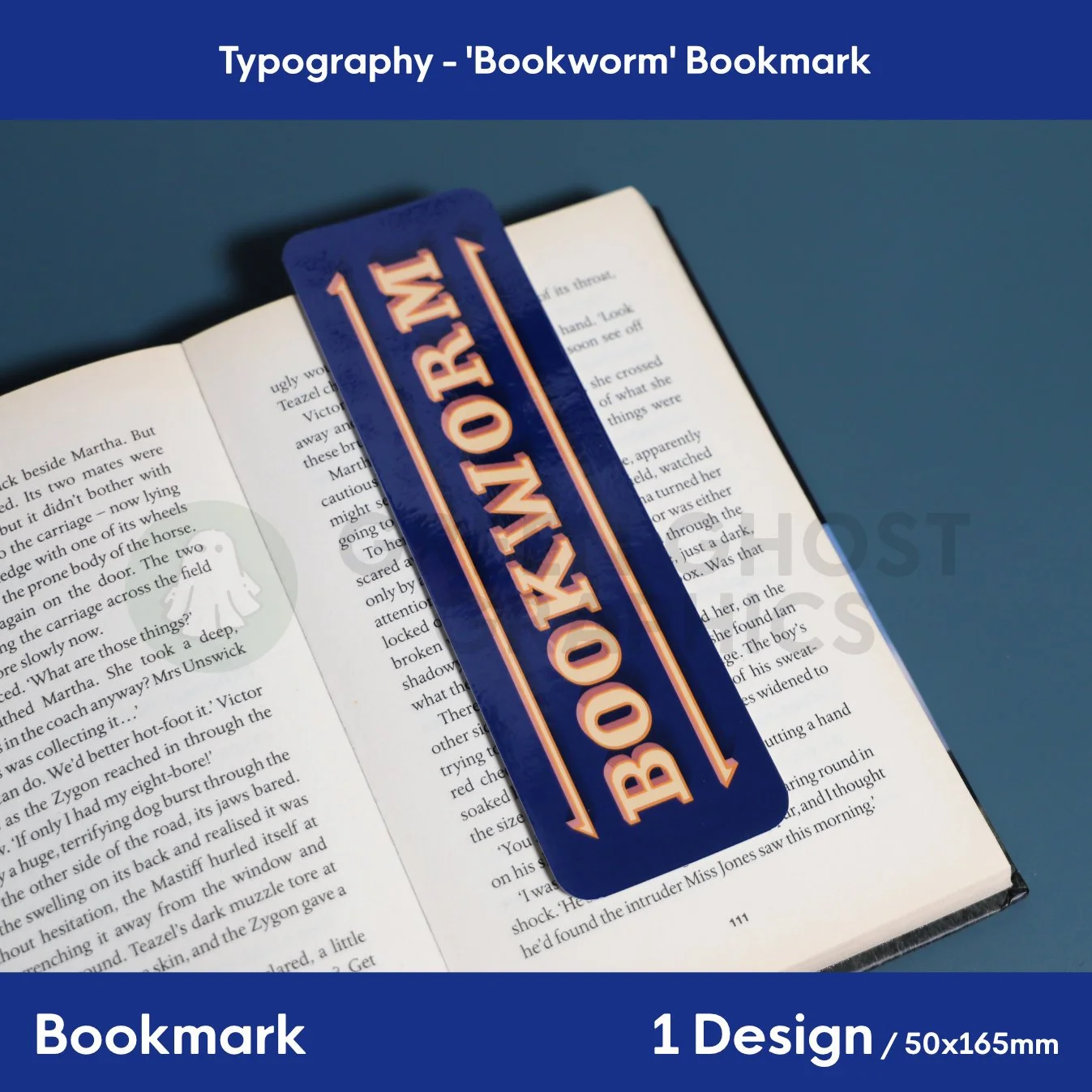 rectangular bookmark with rounded edges. Dark blue background with custom circus style typeface reading 'bookworm', shown for scale against a book.