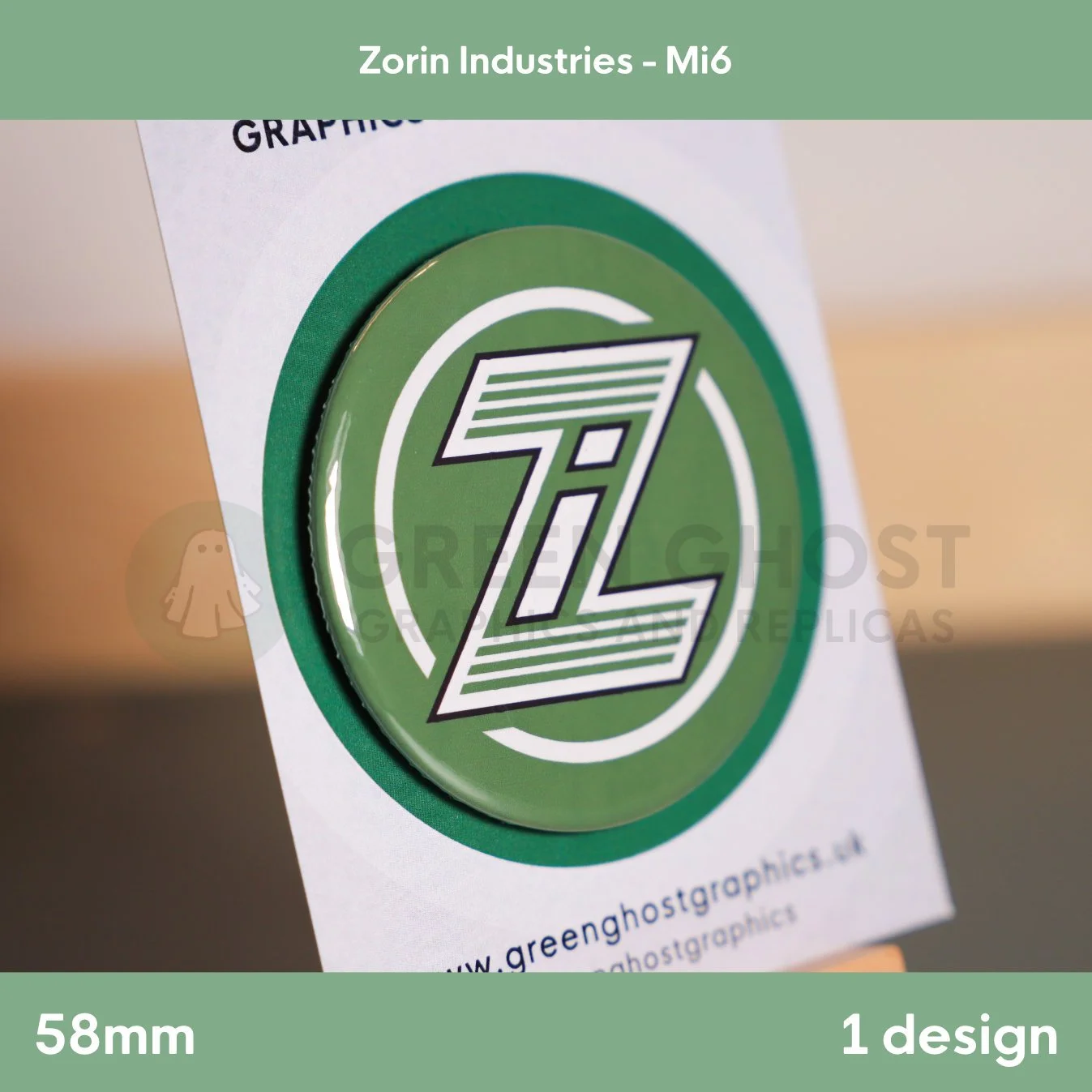 A round badge with a stylised white “Z” over green stripes displayed on a branded card on a wooden easel.