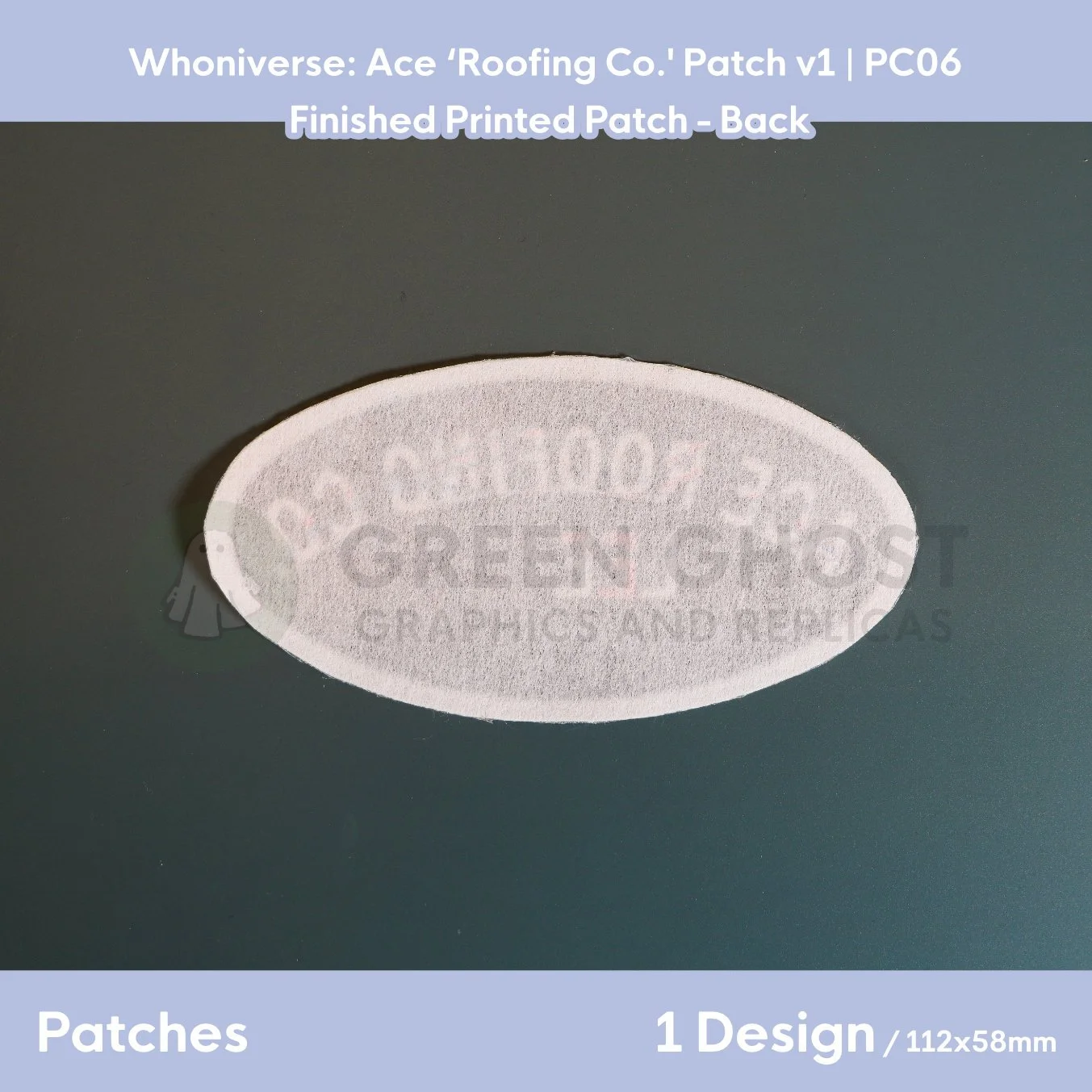 Finished version of the Roofing Co. Lee patch laid flat on a table showing the interfaced backing.