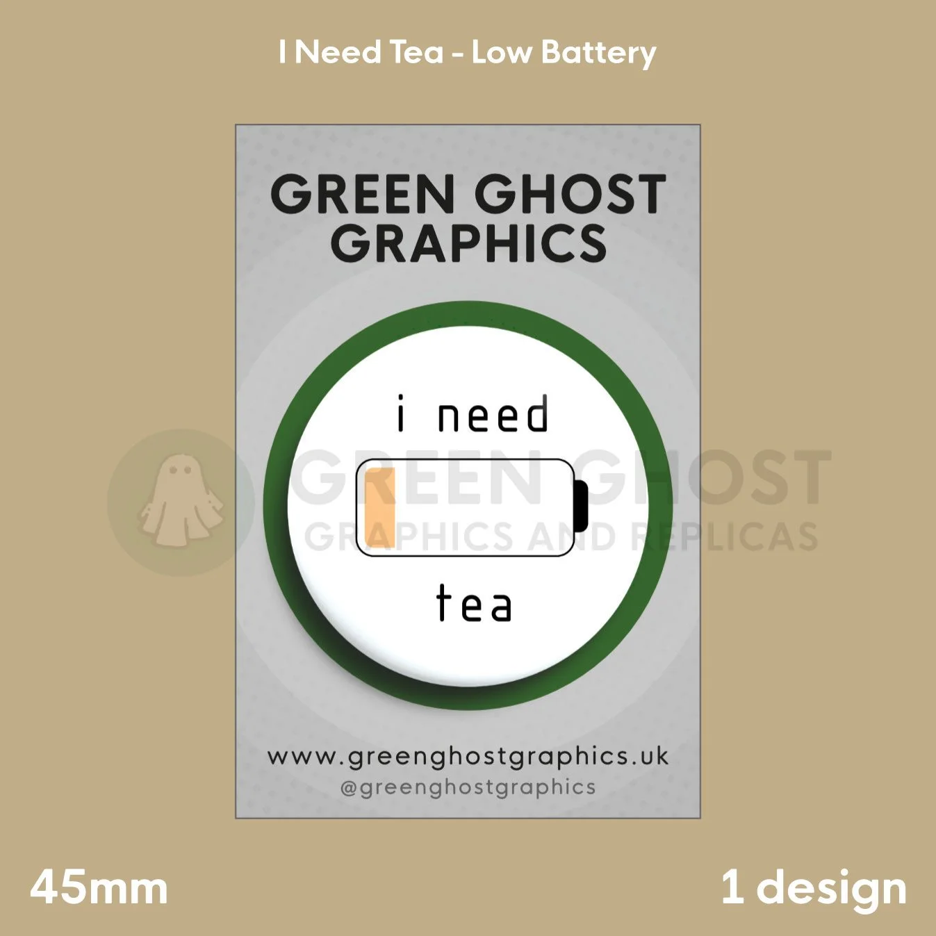 A round white badge with a low‑battery icon and the text “i need tea” displayed on a branded backing card.