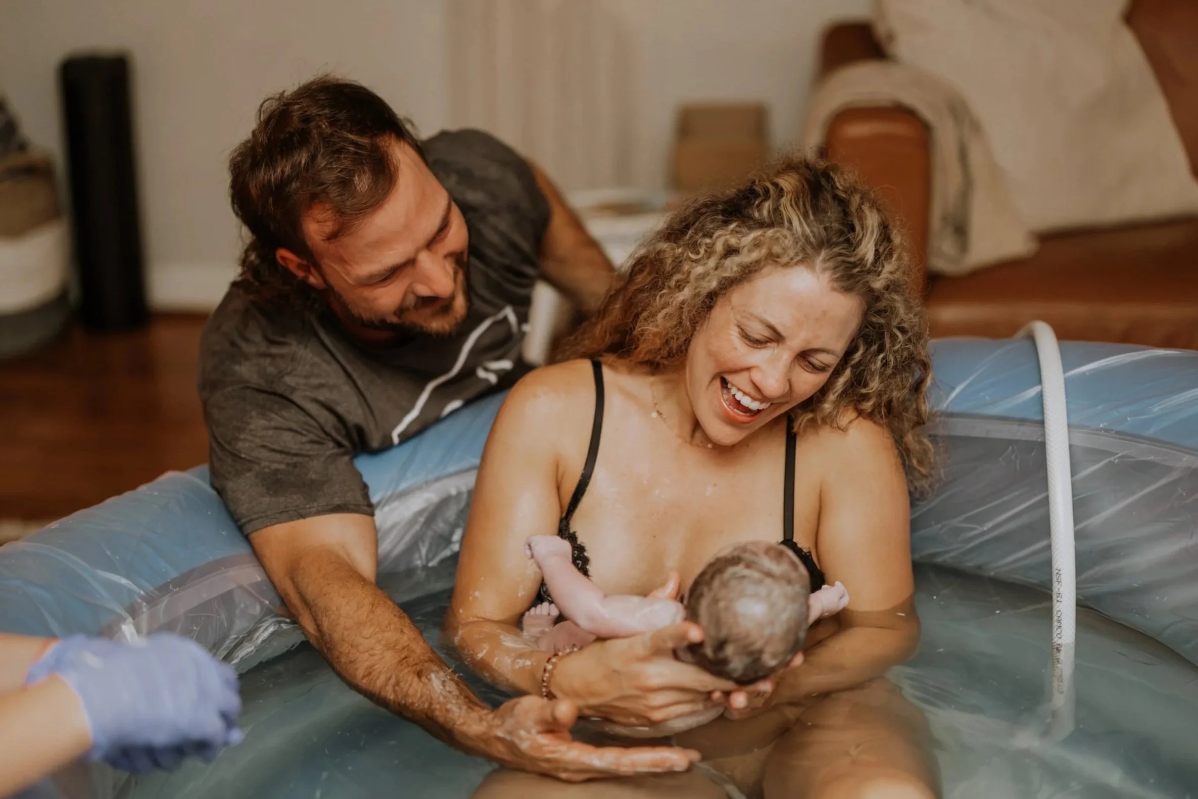 mother meeting her newborn baby right after giving birth to her at home in altamonte springs florida 