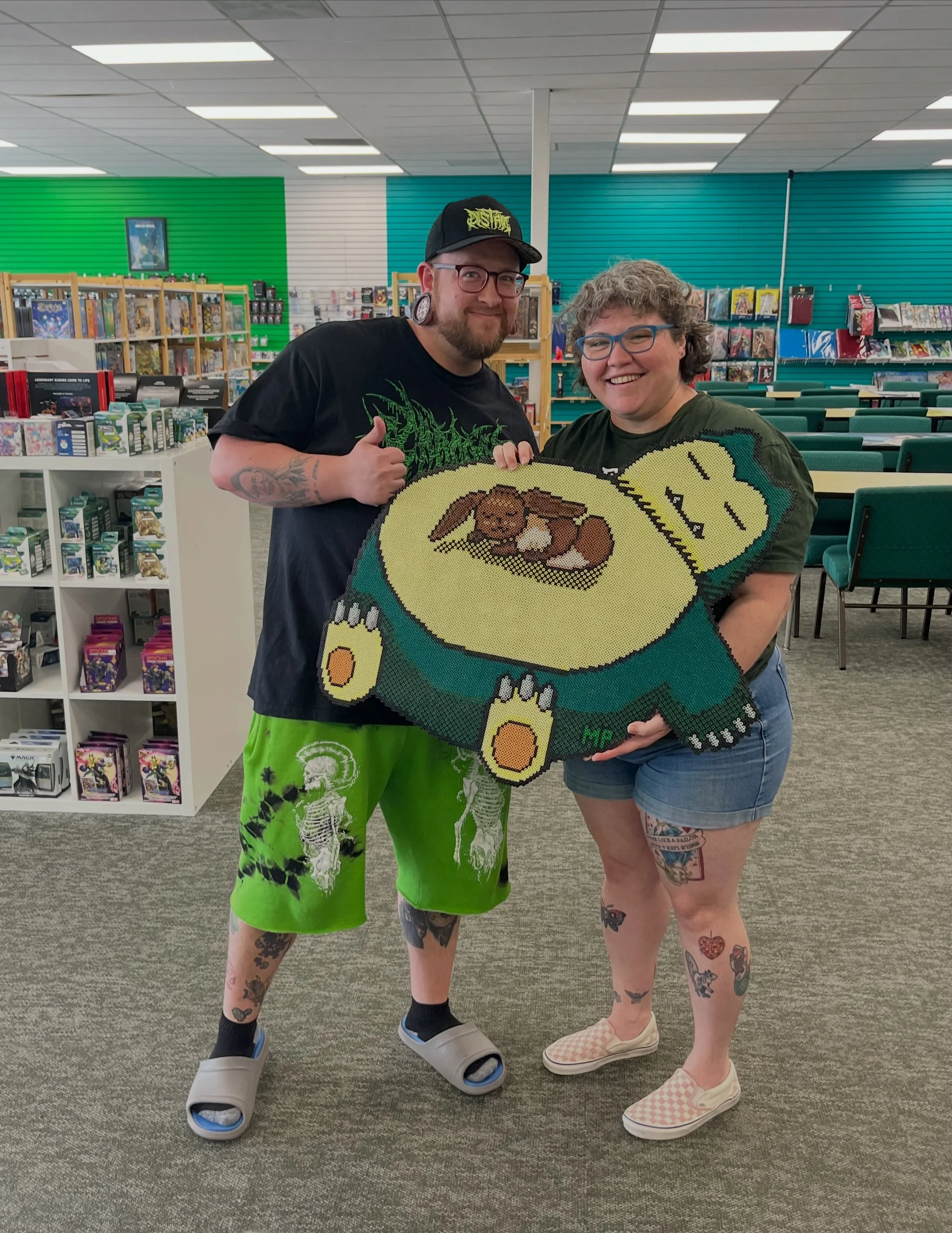 Huge shout out to @perling_pearson for our new Snorlax &amp; Eevee artwork! Thanks for the love and time spent making this. We&rsquo;ll get this tag team duo hung up in the shop for all to enjoy very soon 💚💙🤎