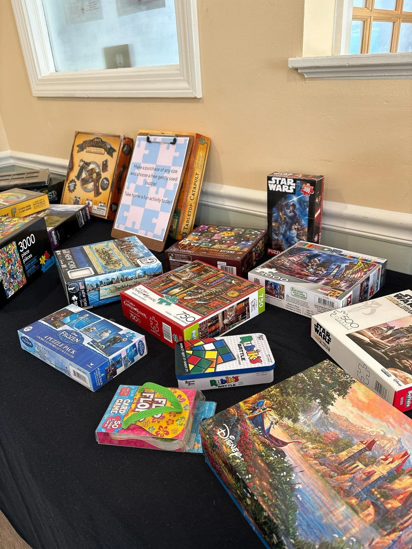 Free puzzles+games with any purchase until supplies last!! Come and take home a gently used puzzle to enjoy at home😊 limit one per person please #puzzle #thesugarchalet #wilbraham