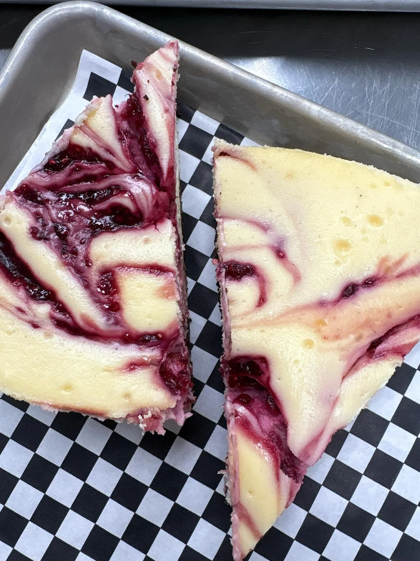 Another cheesecake because you sold out the last one! Creamy vanilla bean and raspberry jam swirl with a fudge brownie crust😋 Come grab a slice! #wilbraham #thesugarchalet #cheesecake