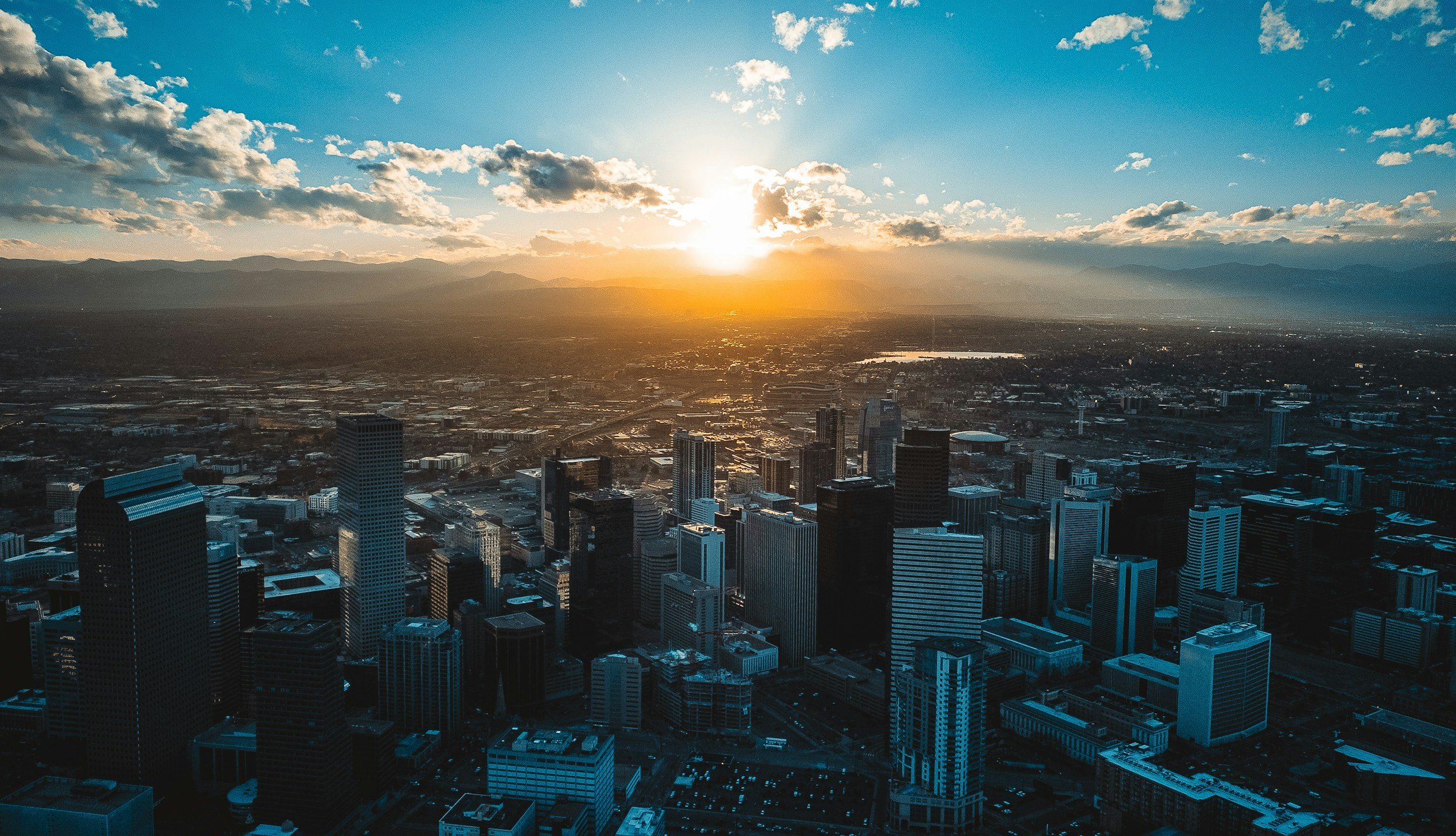 Denver, Colorado skyline at sunset representing calm and reflection for anxiety therapy.