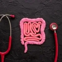large bowel with a stethoscope on a black background