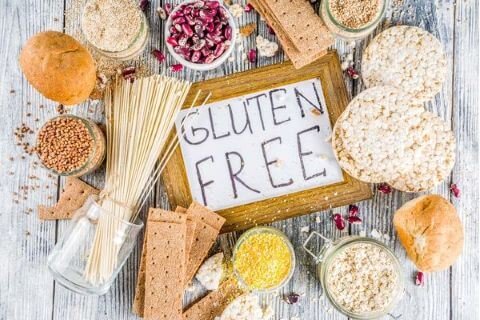Gluten free sign surrounded by gluten free foods