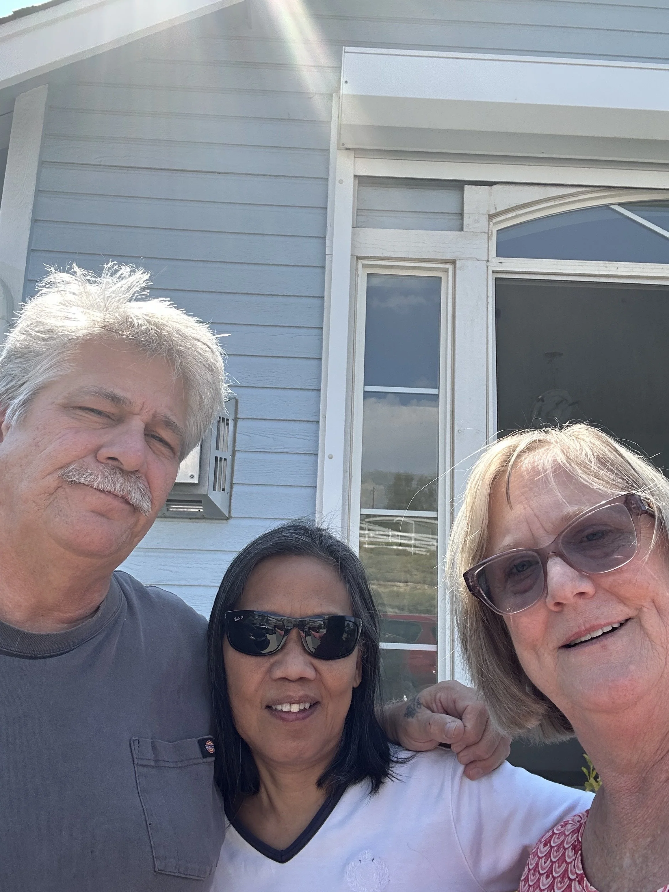 Lisa Williams talking with a senior homeowner during a real estate consultation.