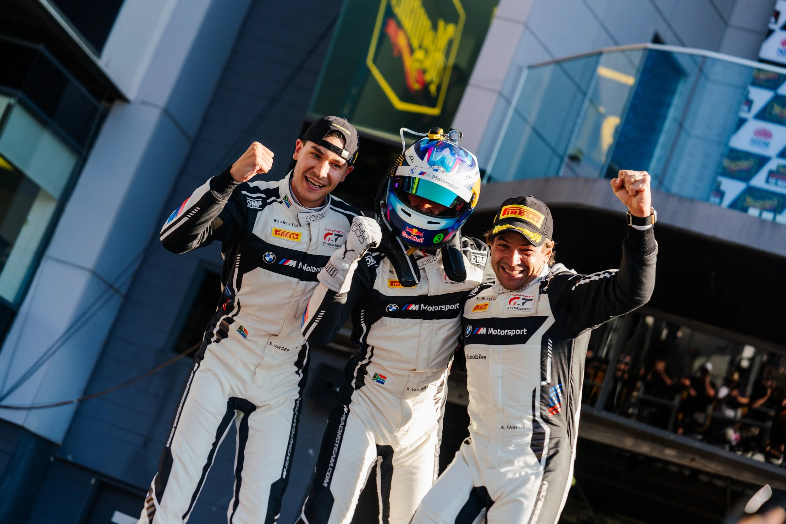 Sheldon van der Linde, Kelvin van der Linde and Augusto Farfus celebrate their 2025 Bathurst 12 Hour victory with their WRT BMW GT3 car.