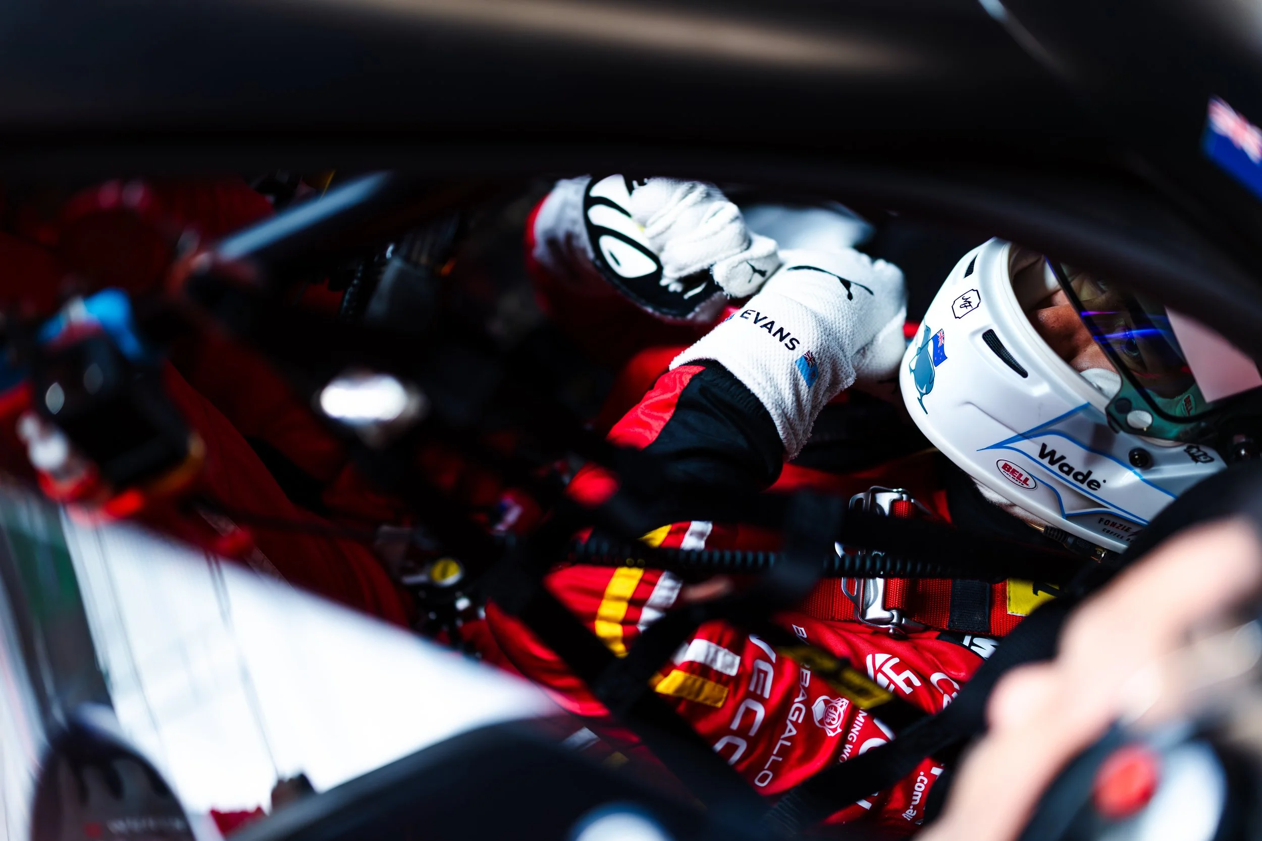 Jaxon Evans strapping into the Arise Racing GT Ferrari 296 GT3 during the 2025 Sandown GTWCH Australia round.
