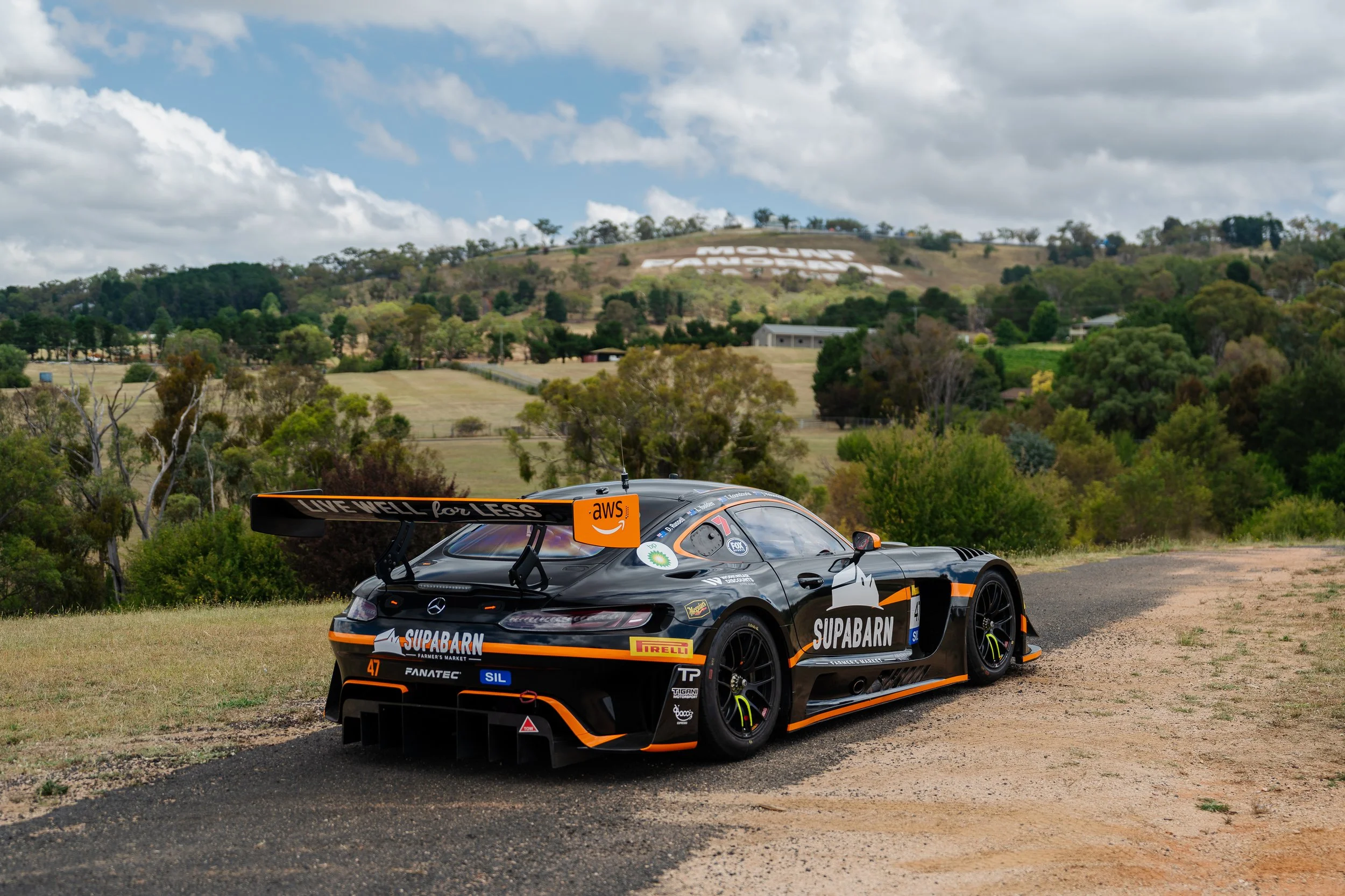 Tigani Motorsport Mercedes AMG GT3 car team shoot with Mt Panorama in the Background at the 2025 Bathurst 12 Hour event.
