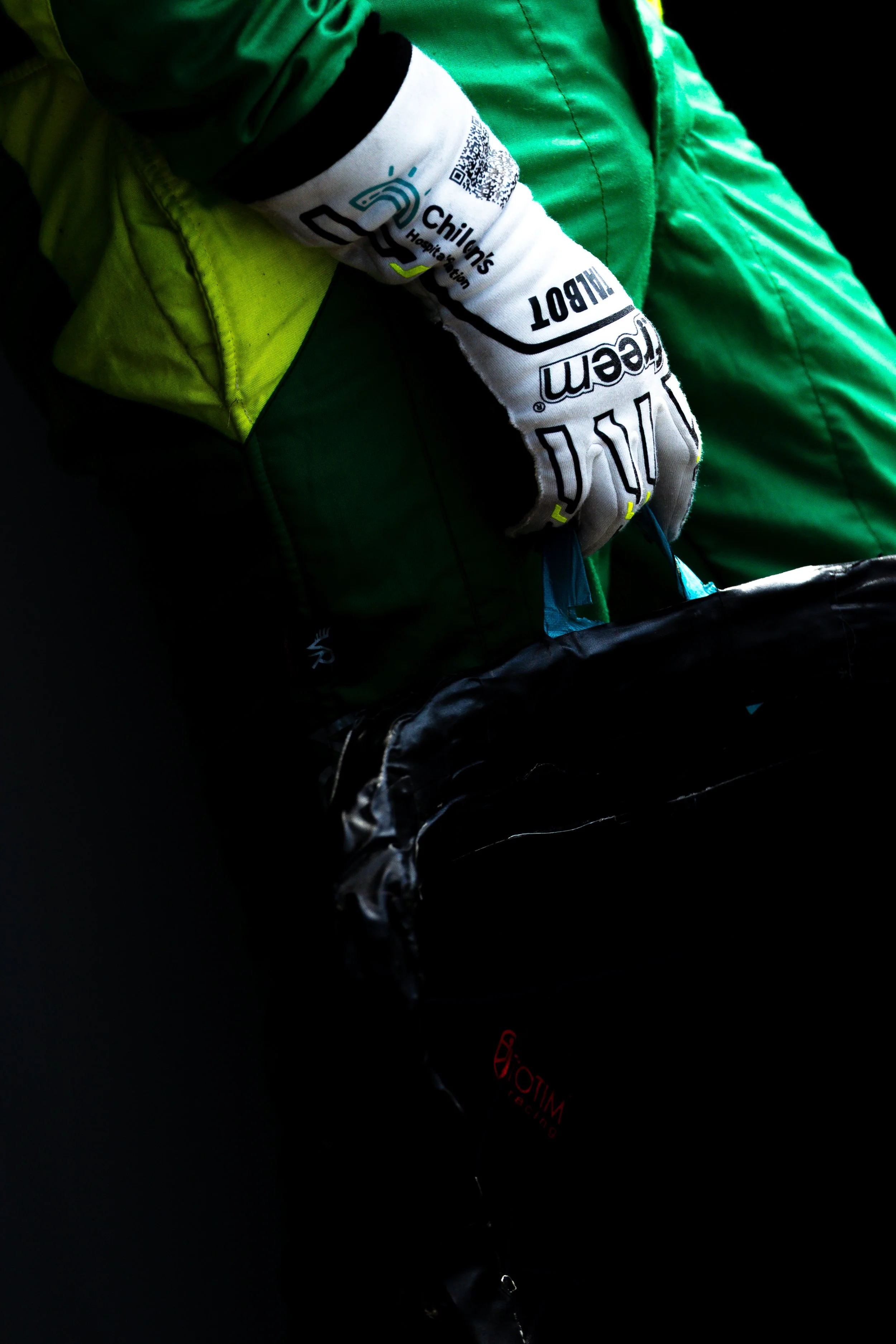 Liam Talbot holding his seat insert.