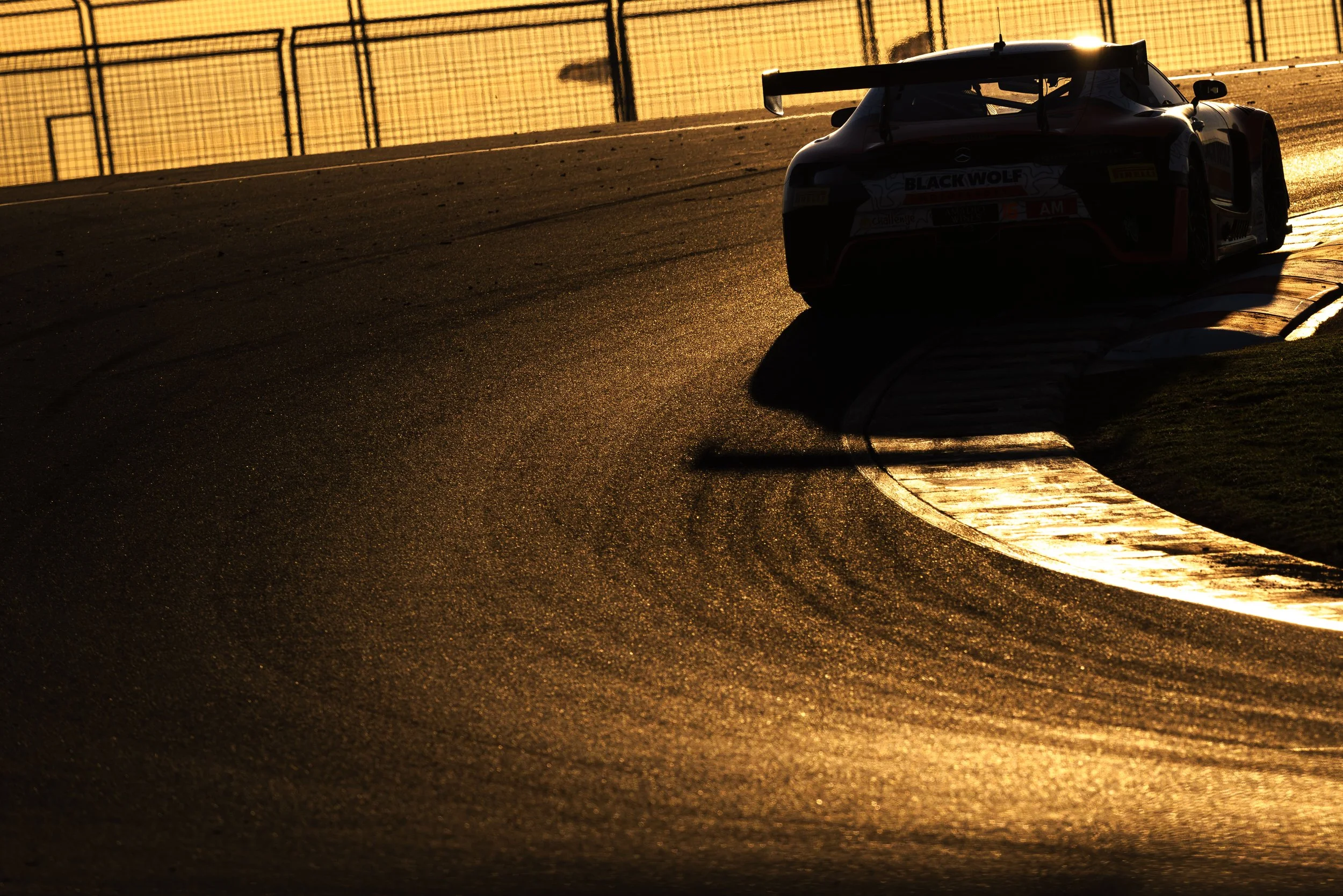 Blackwolf Racing Mercedes-AMG GT3 at sunset during the 2025 GT World Challenge Australia round at The Bend.