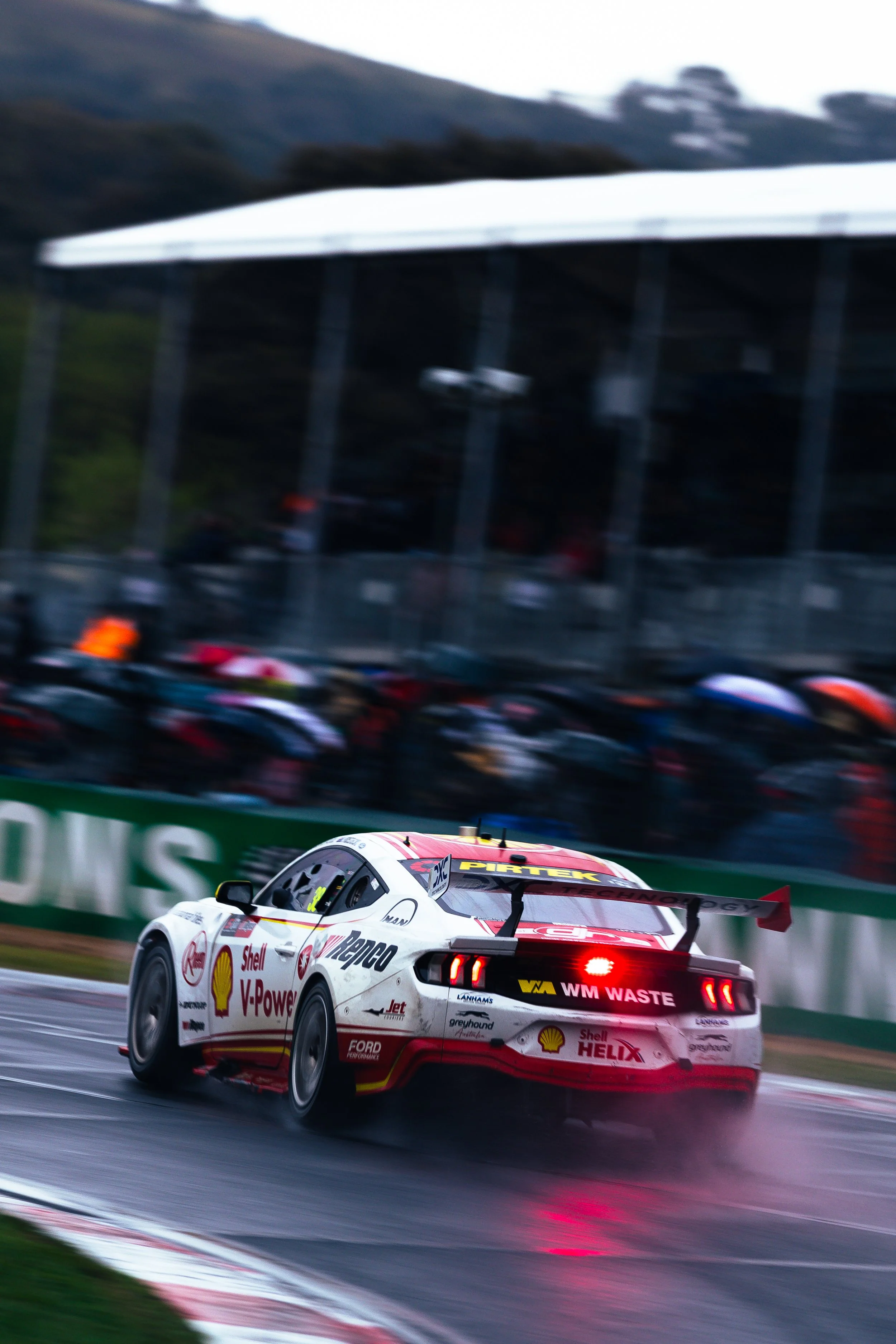Dick Johnson Racing Ford Mustang exiting Turn 1 with rain lights on at the 2025 Bathurst 1000