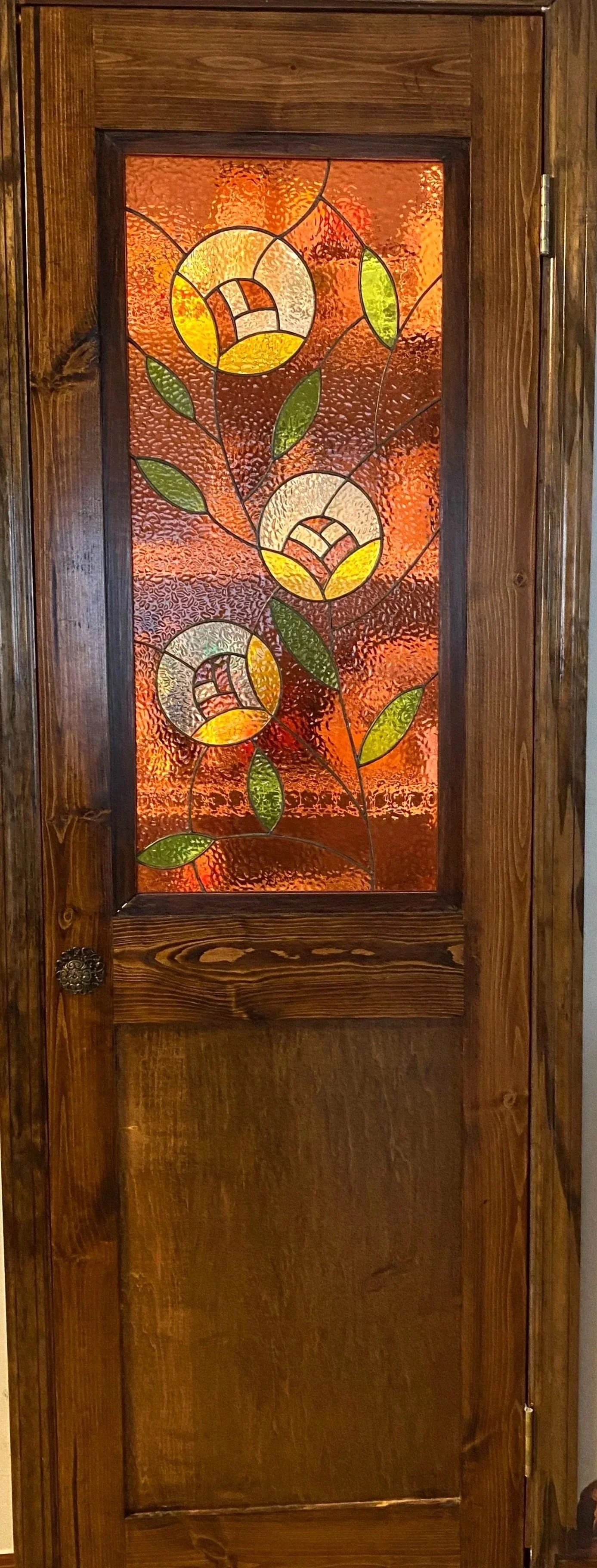 Pantry door with inset stained glass