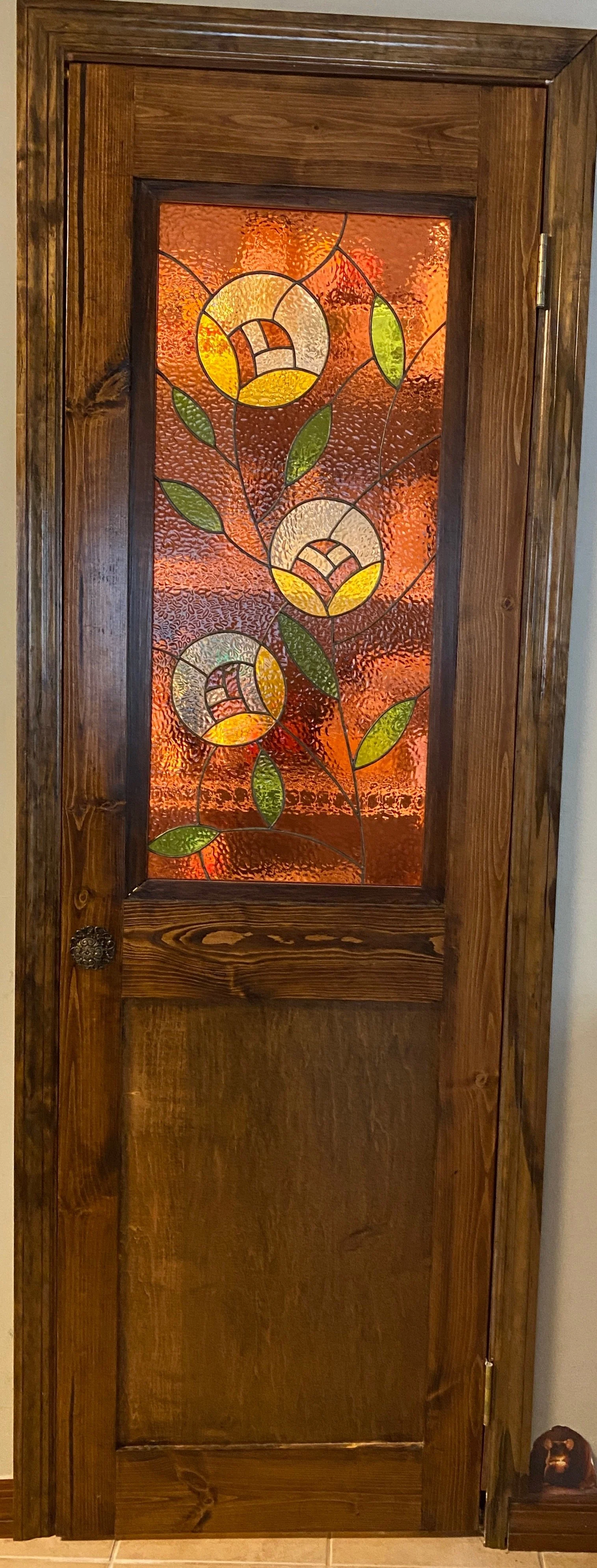 Pantry door with inset stained glass