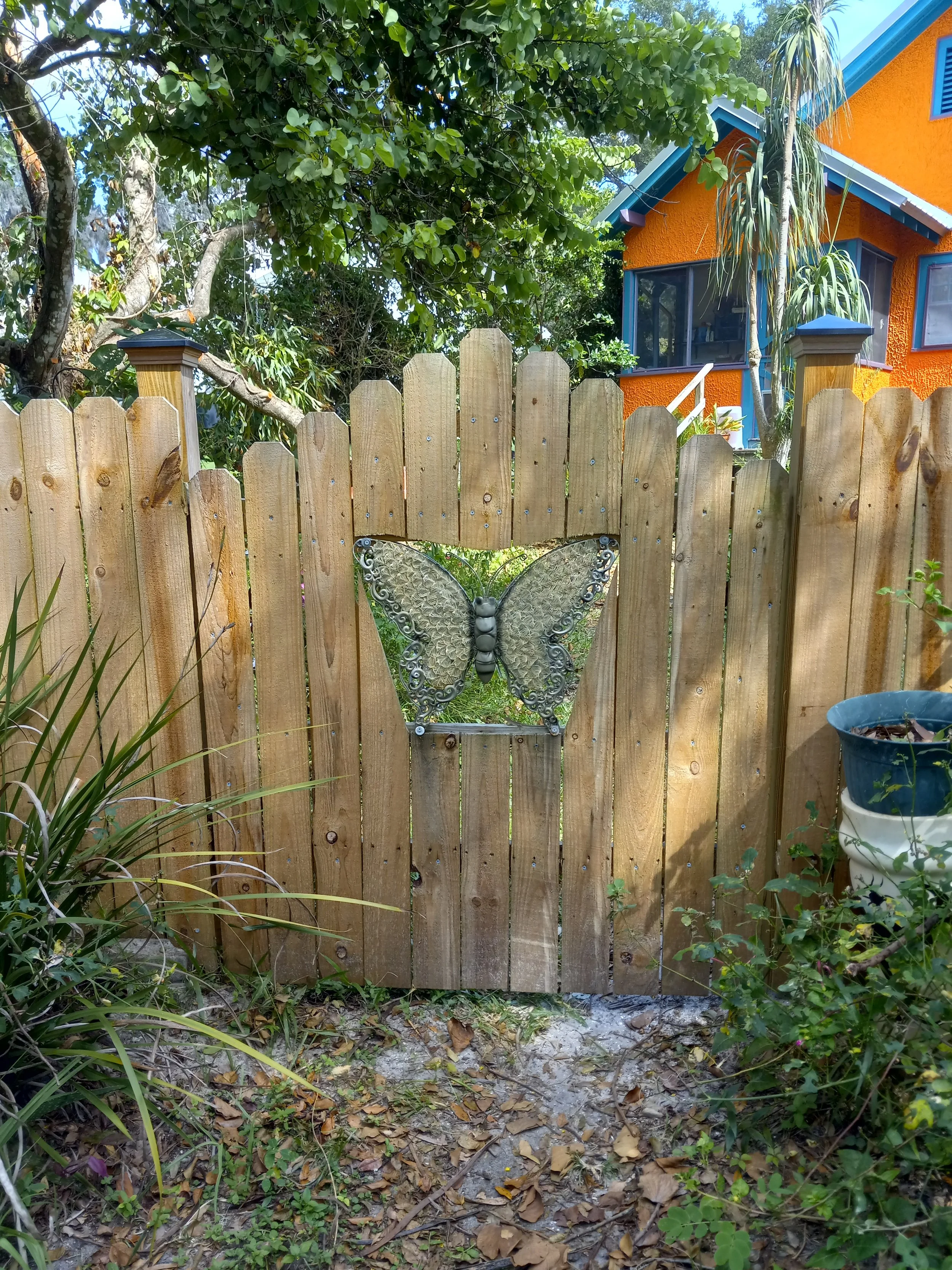 Custom fence and gate with inset artwork