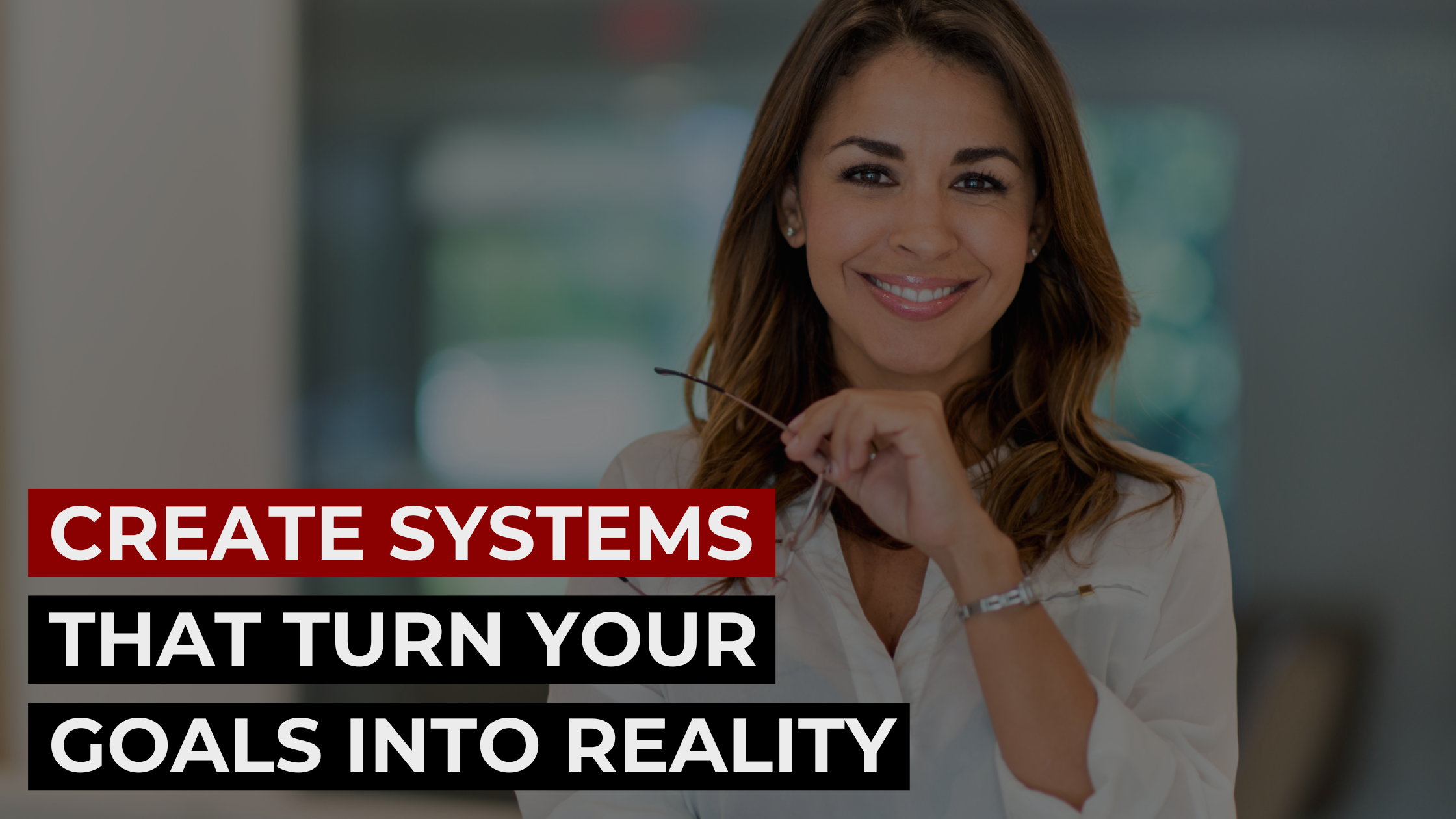 Smiling business coach with glasses and headline about creating systems to turn goals into reality