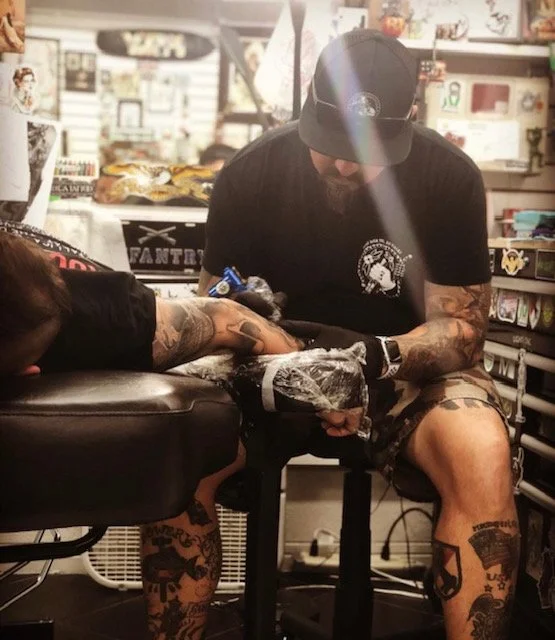 black and grey realism tattoo artist