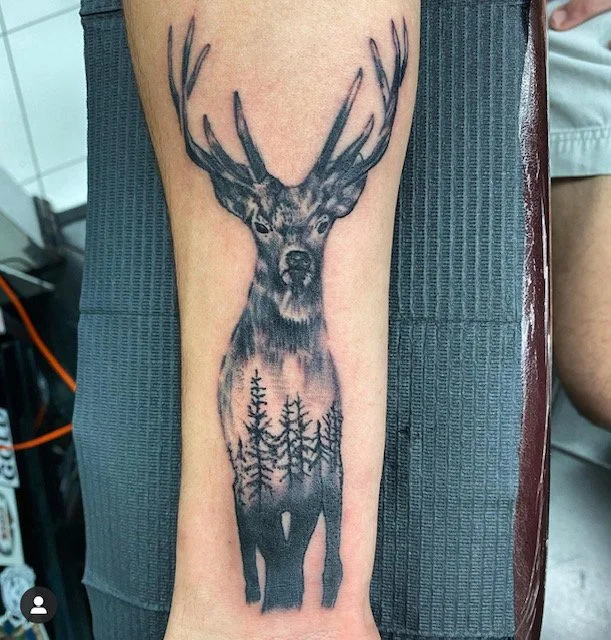 black-grey-deer-forearm-tattoo-treasure-island-fl.jpg