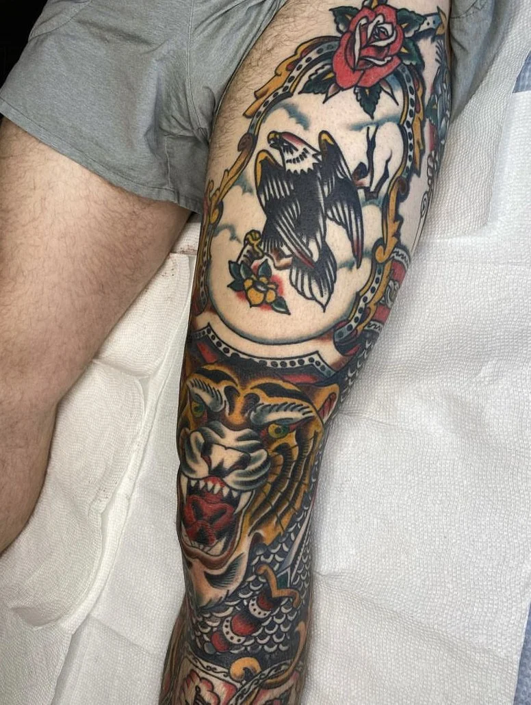 color-eagle-and-tiger-leg-tattoos-treasure-island-fl.jpeg