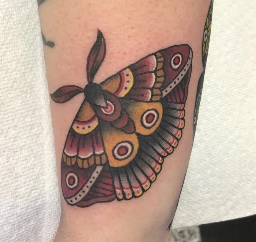 color-moth-forearm-tattoo-treasure-island-fl.jpg