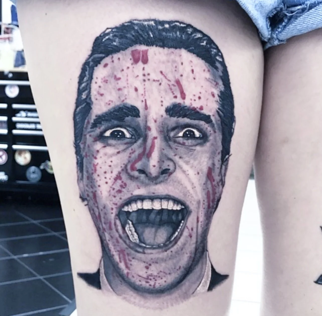 black-grey-realism-american-psycho-thigh-tattoo-treasure-island-fl.jpg