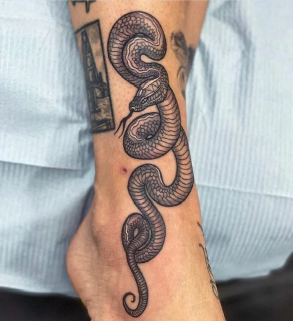 black-grey-snake-ankle-tattoo-treasure-island-fl.jpg