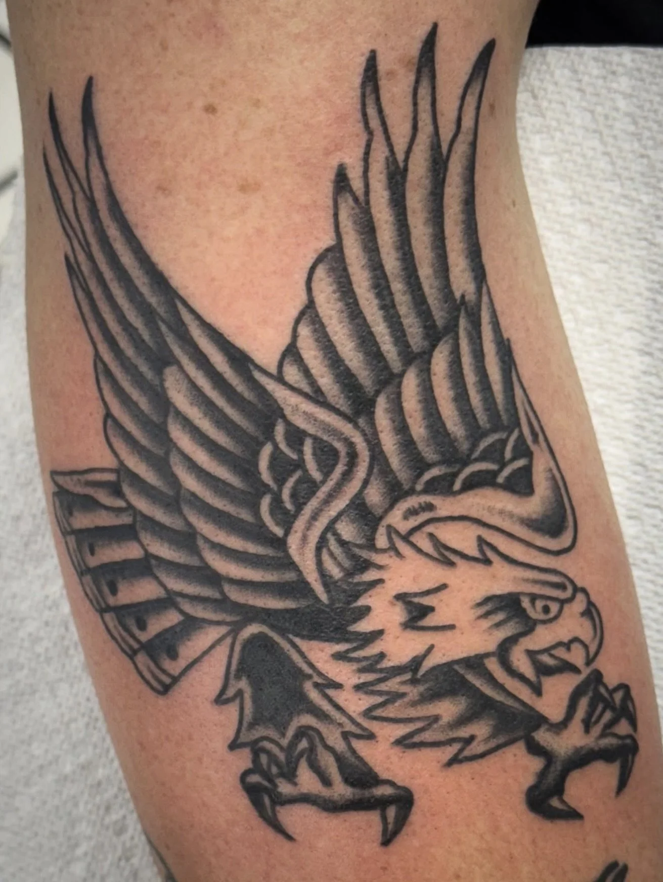 black-grey-eagle-arm-tattoo-treasure-island-fl.jpg