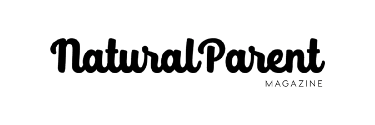 Magazines cover titled 'NaturalParent' magazine in black cursive font on a white background