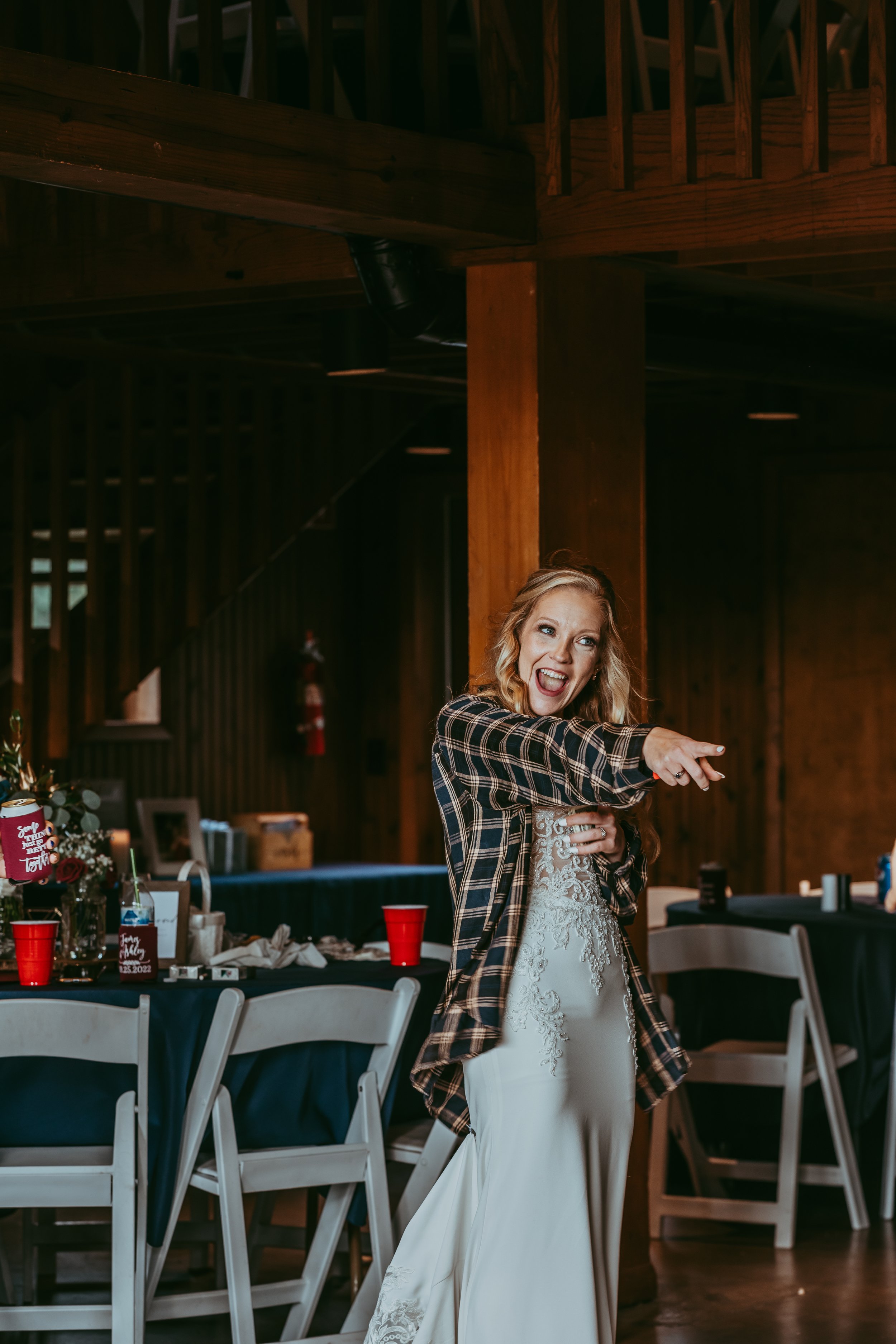 Bride dancing at barn of Benham's grove wedding and event venue Dayton Ohio wedding photographer
