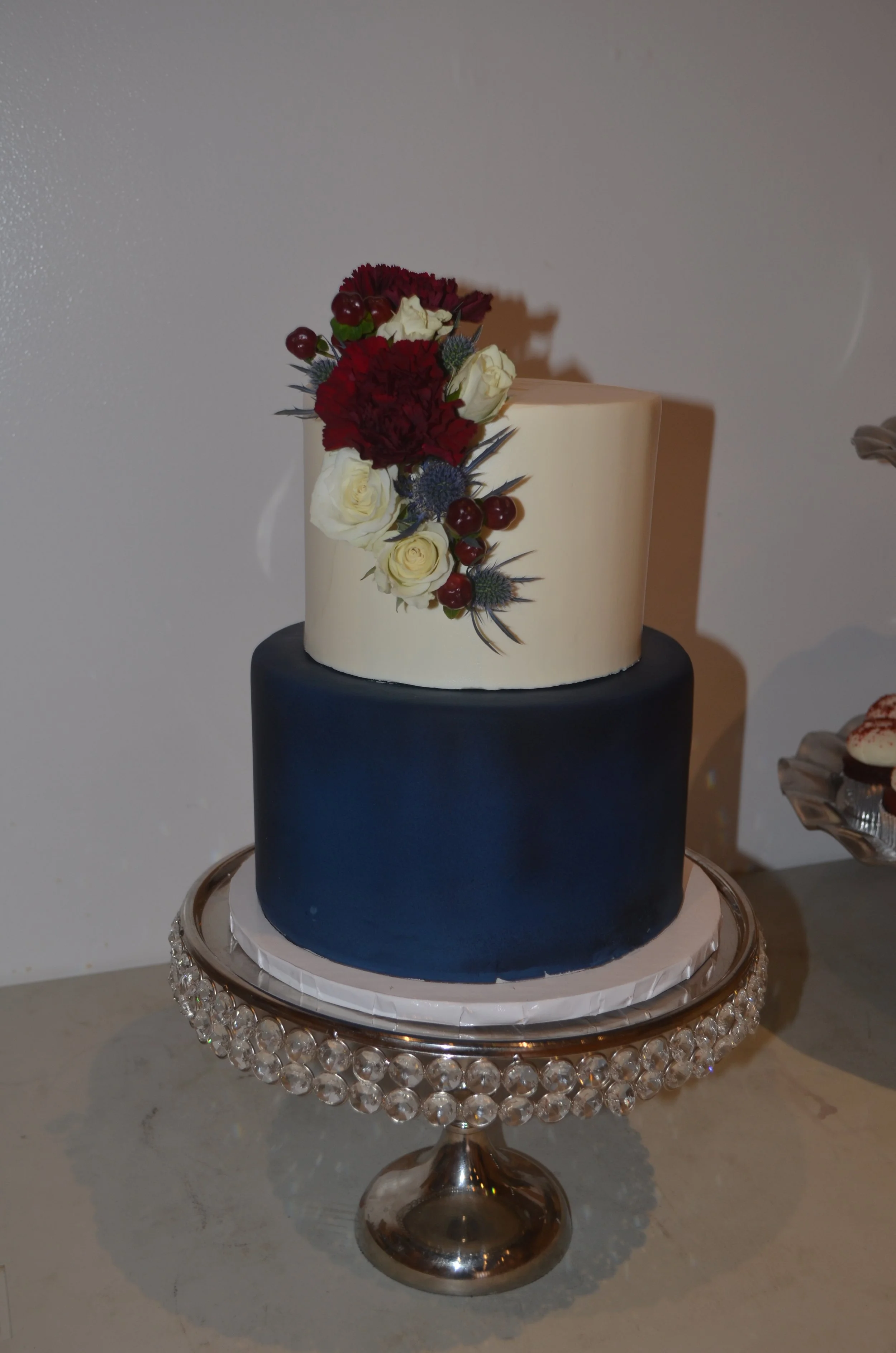 Cascading flowers on the cake