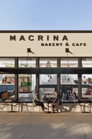 Macrina Bakery & Cafe exterior with people seated at outdoor tables and visible interior seating area.