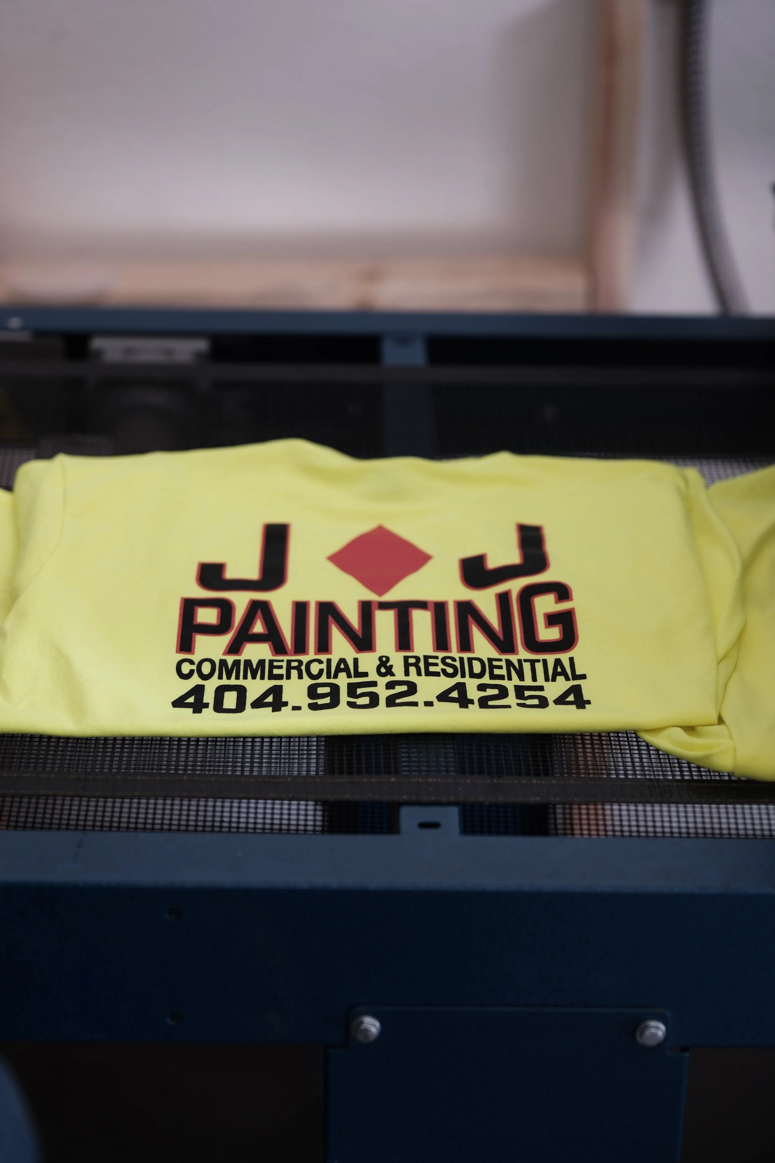 Custom screen printed safety green, high visibility, Gildan 5000 shirts at Meloprint in Riverside, CA. 