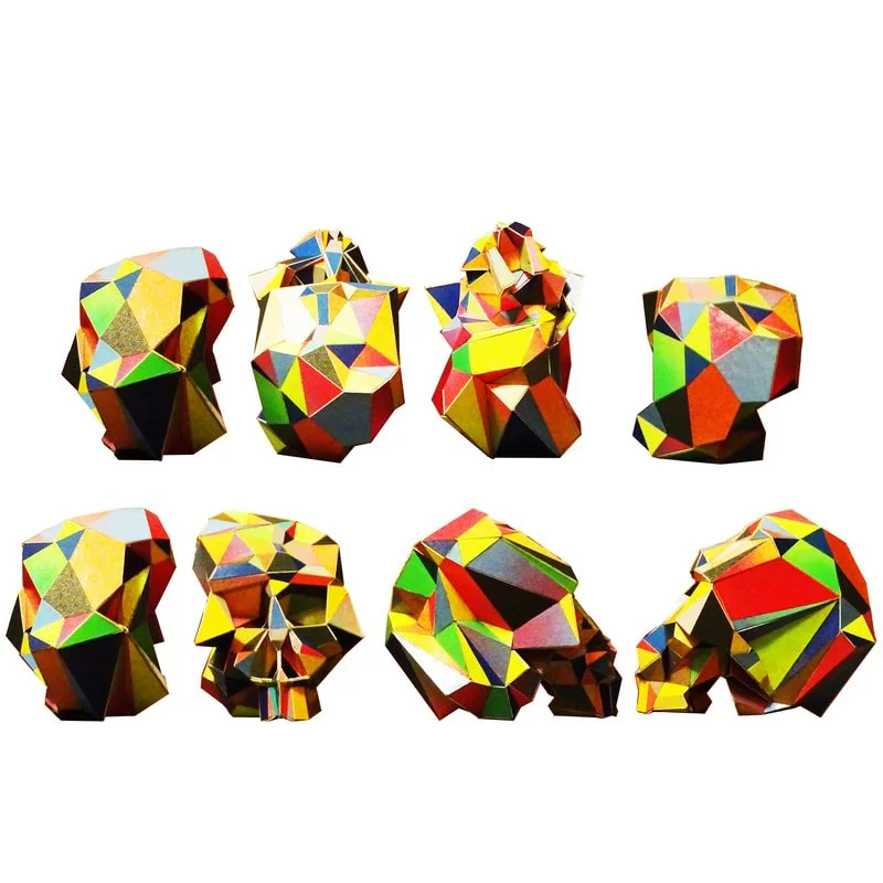 Colorful geometric sculptures resembling rocks, shells, and animals arranged in two rows against a white background.