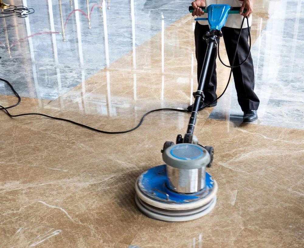 Linoleum floor being waxed.