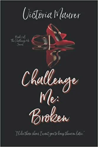 Book cover titled 'Challenge Me: Broken' by Victoria Maurer, featuring a pair of red high-heeled shoes on a black background.